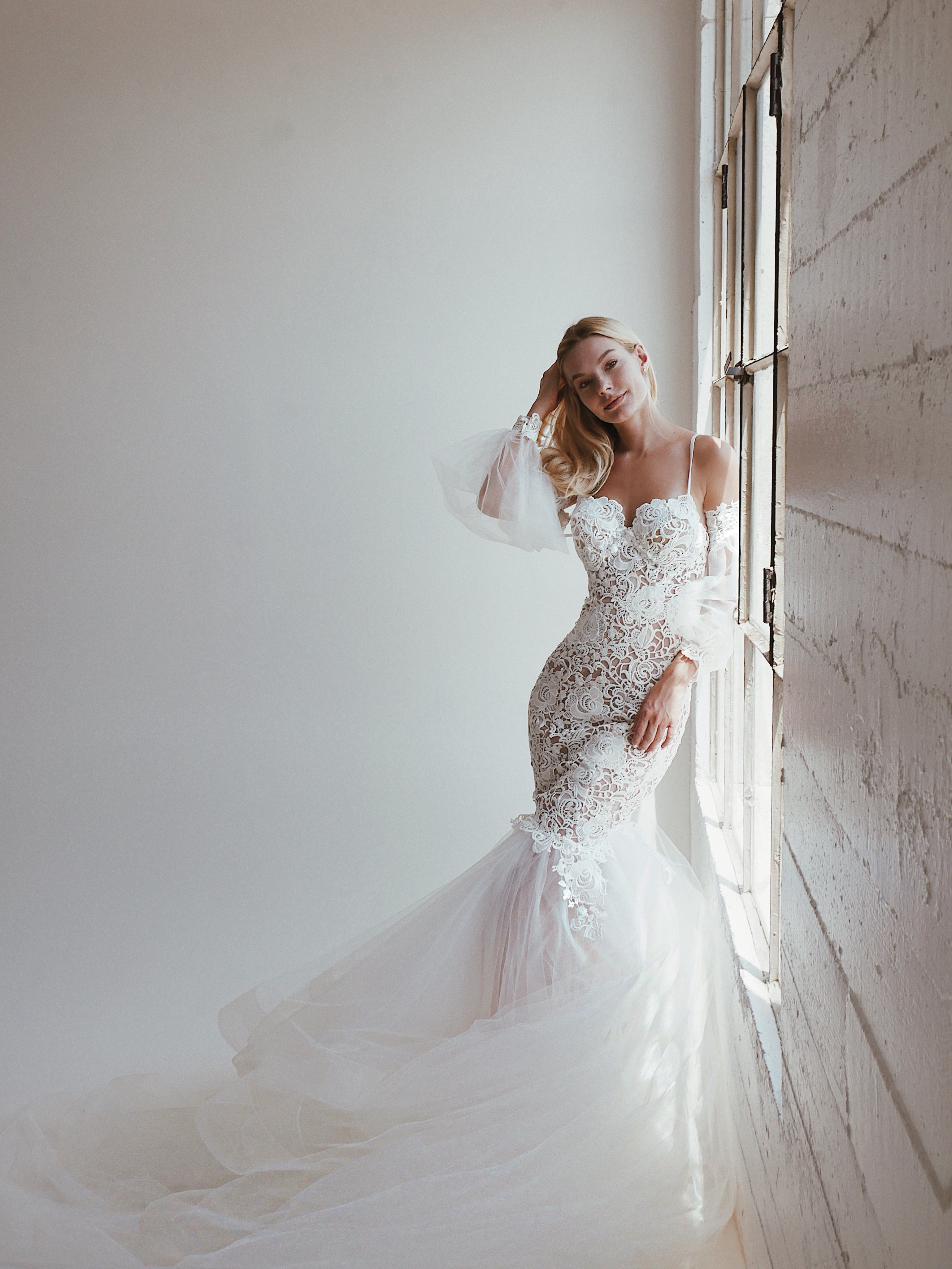 Bohemian lace mermaid wedding dress with detachable sleeves and train by Lauren Elaine Bridal Los Angeles