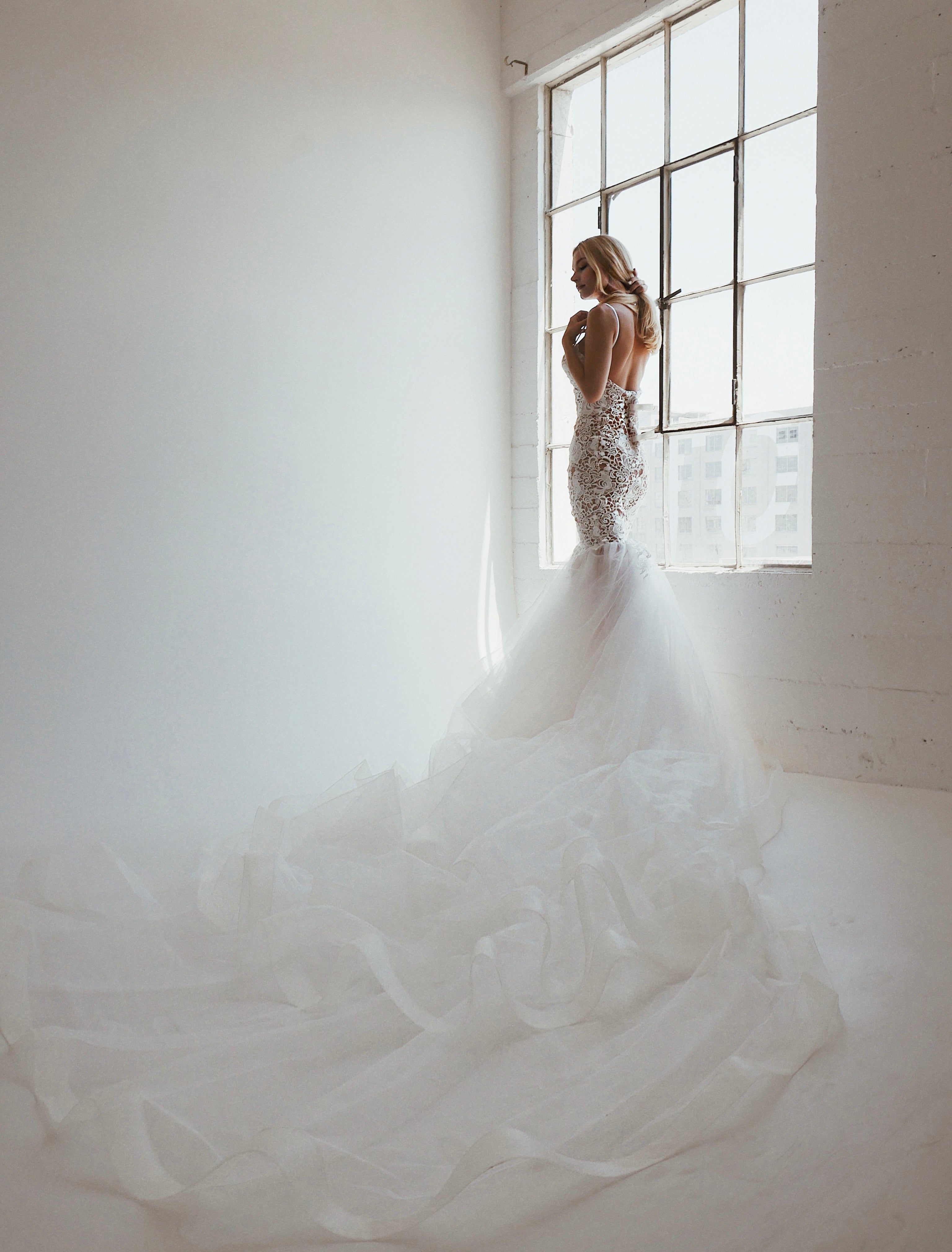 Bohemian mermaid wedding dress with corset and train by Lauren elaine bridal