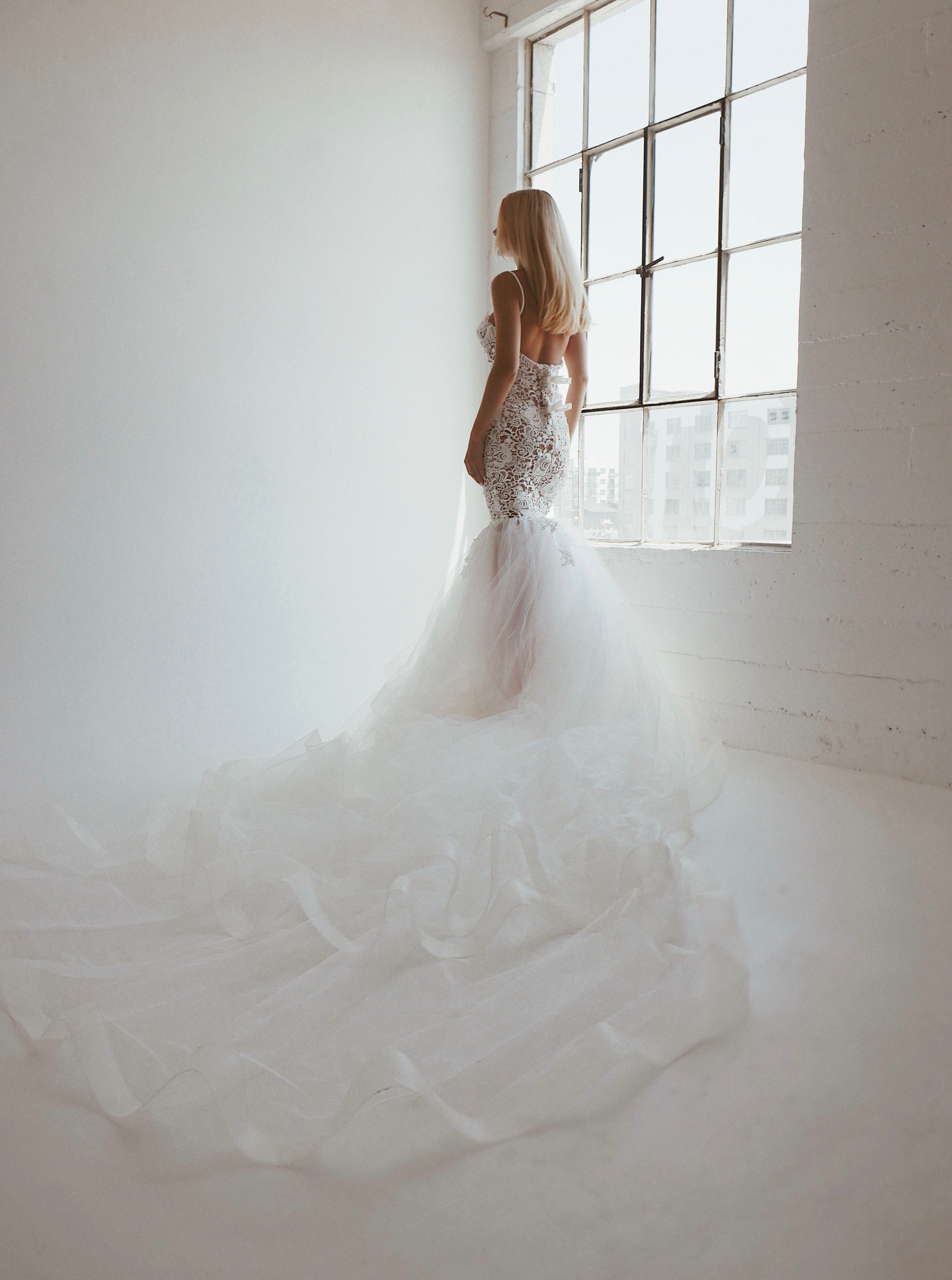 Lauren Elaine bohemian mermaid wedding dresses with trains in Los Angeles, California