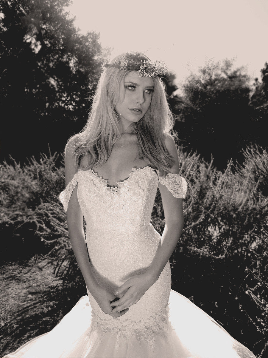 romantic lace mermaid wedding dress by Lauren Elaine with off the shoulder ruffle sleeves.
