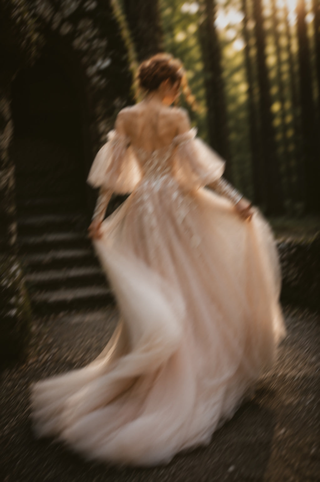 Arrowyn ethereal bridal gown in motion featuring layered tulle skirt and illusion back.