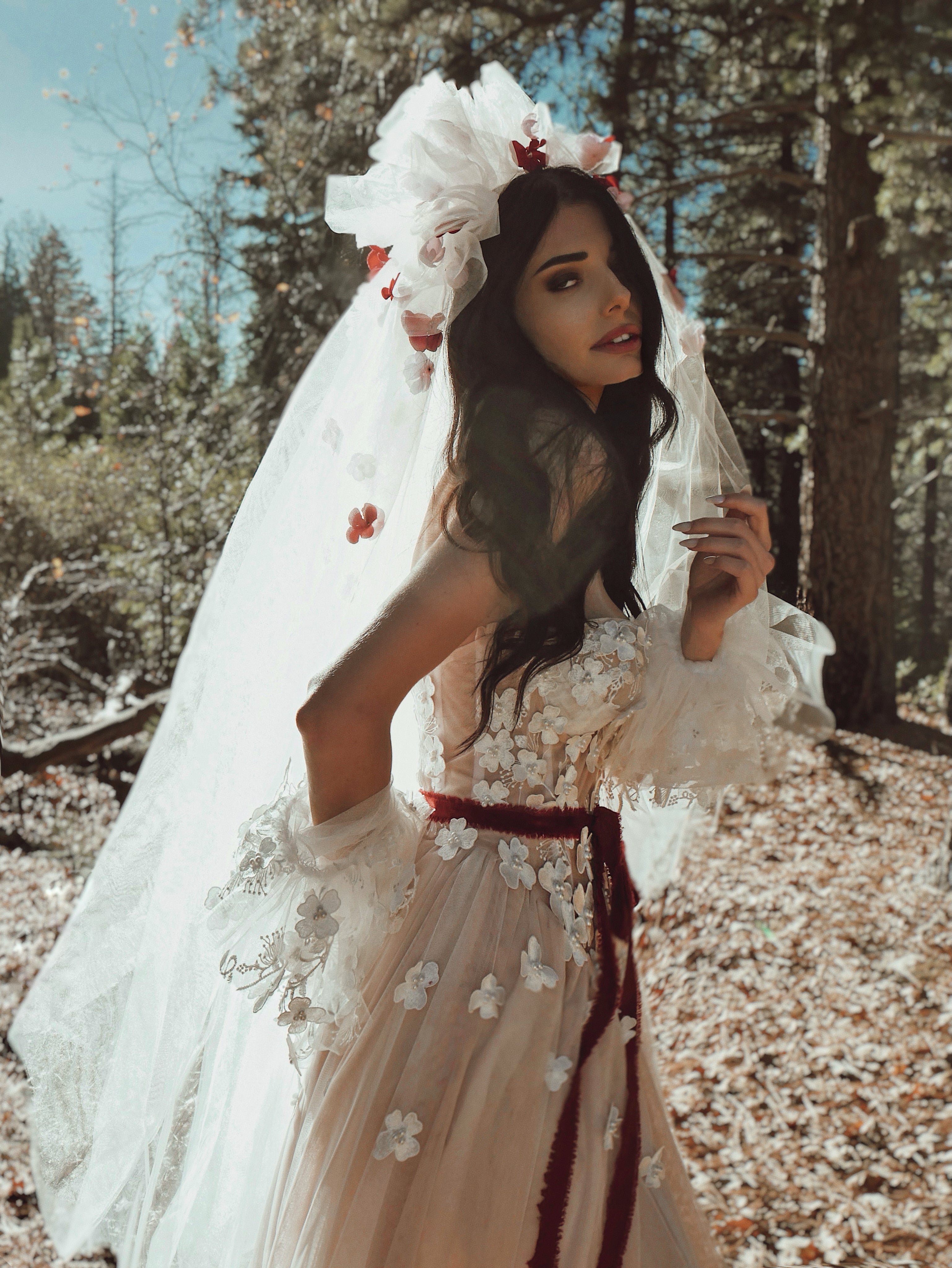 Romantic editorial bridal image featuring the CHÉRIE 1980s-style tulle veil with sculptural crown pouf by Lauren Elaine.