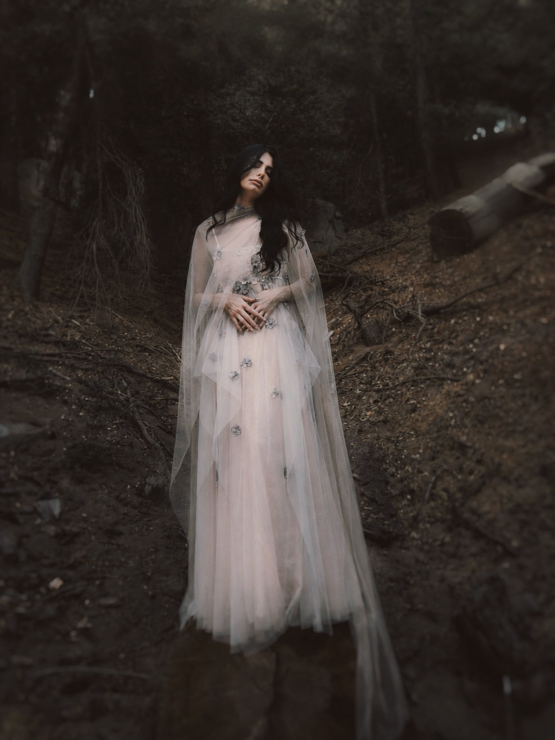 Florêve Midnight dark floral wedding dress with gray wildflower appliqués and sheer ethereal tulle cape