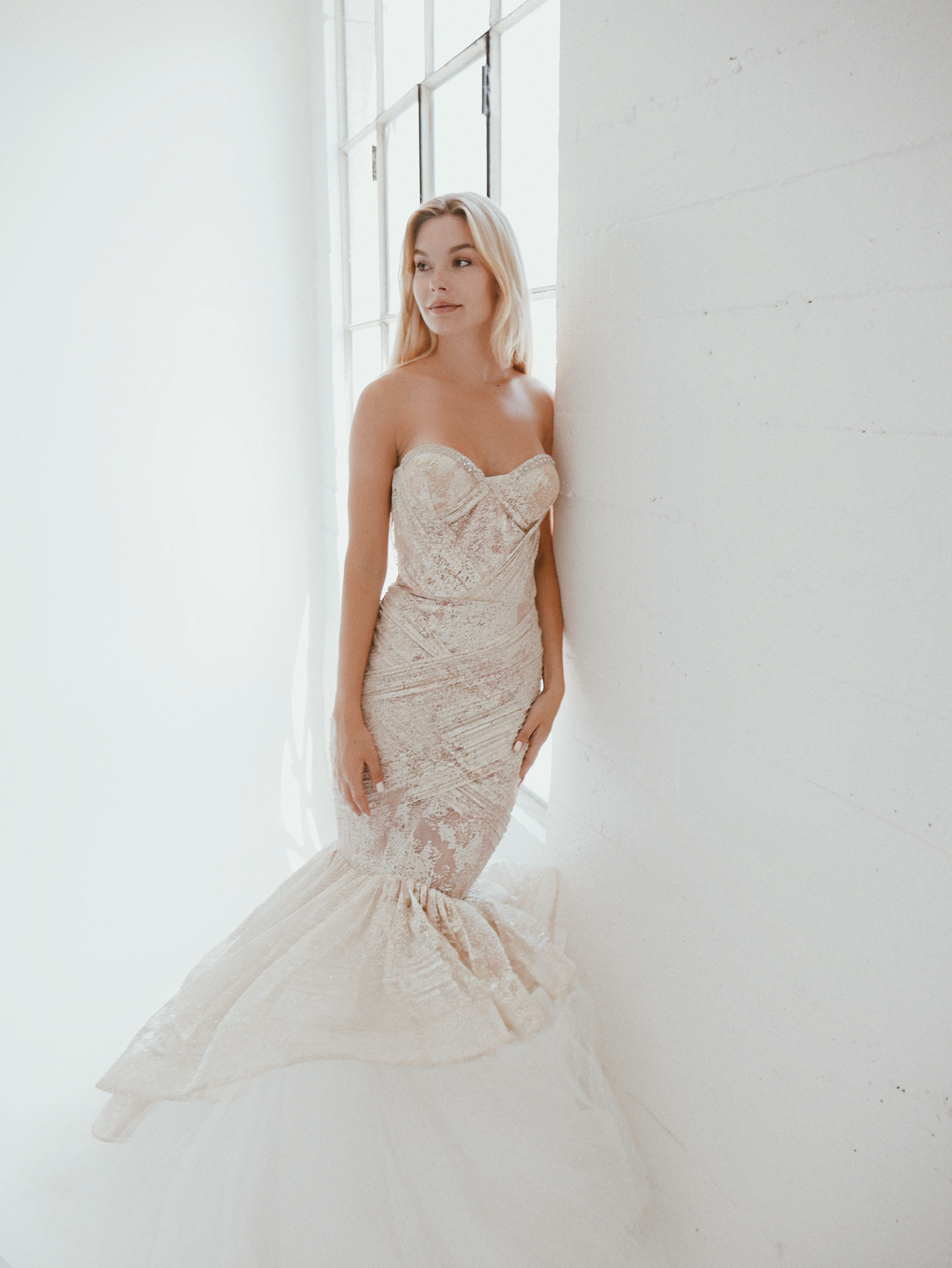 Los Angeles bride in a strapless mermaid wedding gown during a private Luxe bridal appointment at Lauren Elaine Bridal.