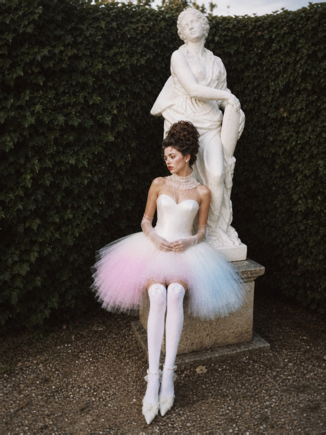 Opaline Mini colorful wedding dress styled with pastel ombre feathered tulle skirt in editorial bridal portrait