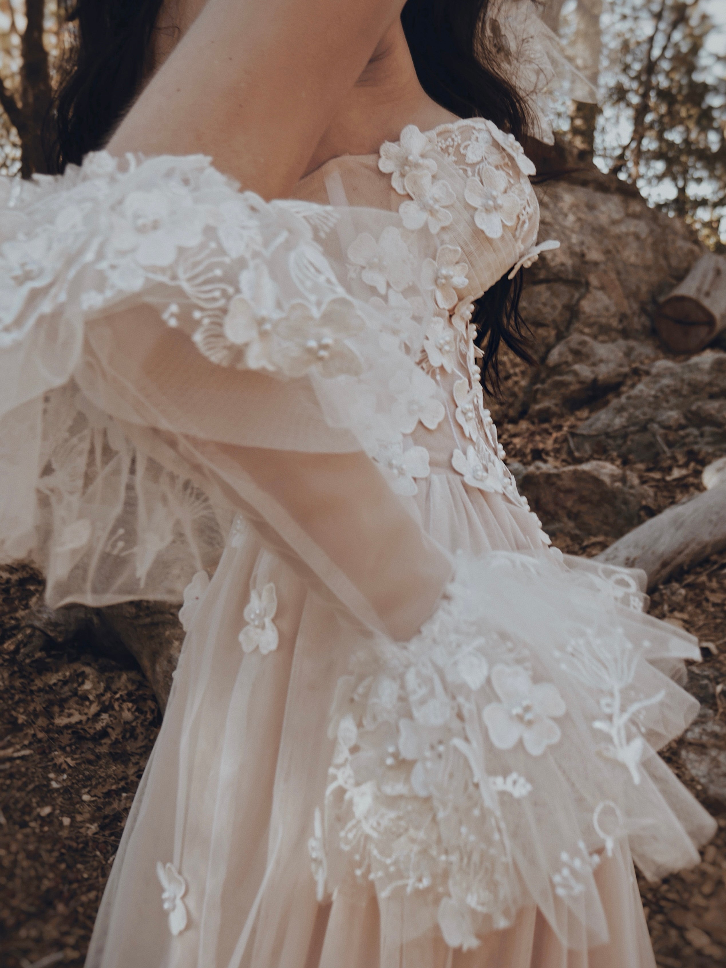 Valen floral corset wedding dress with dimensional lace flowers, sweetheart neckline, and romantic blush tulle skirt