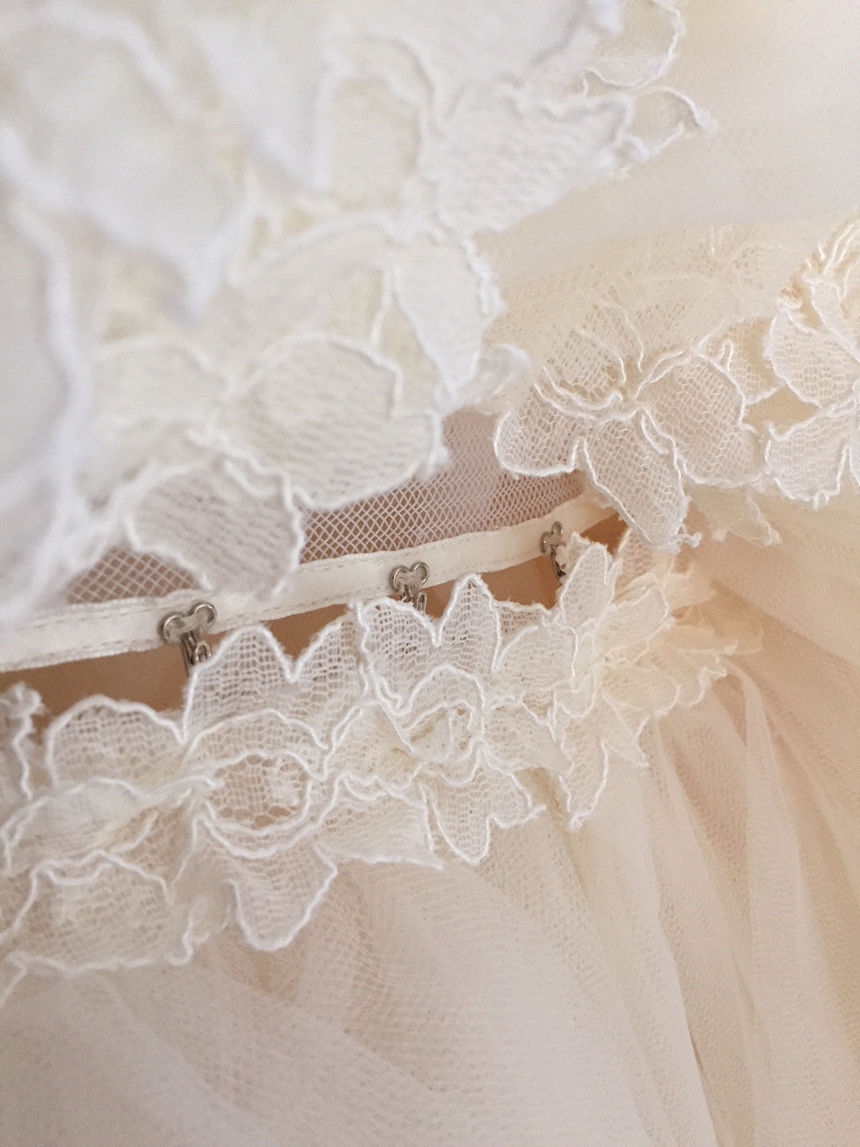 Detachable cathedral length train on the Lauren Elaine Aurelia wedding gown.