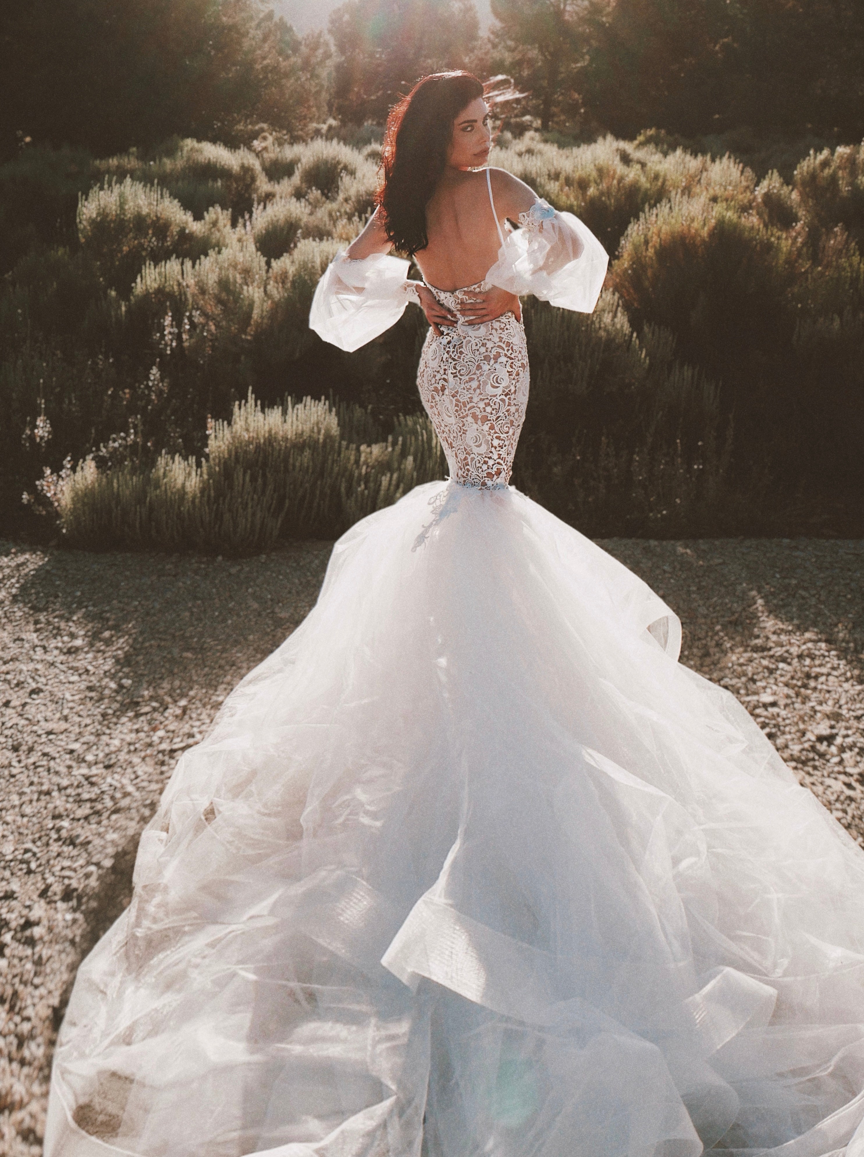 Arcadia boho chic corset mermaid wedding dress of guipure lace by Lauren Elaine Bridal in Los Angeles