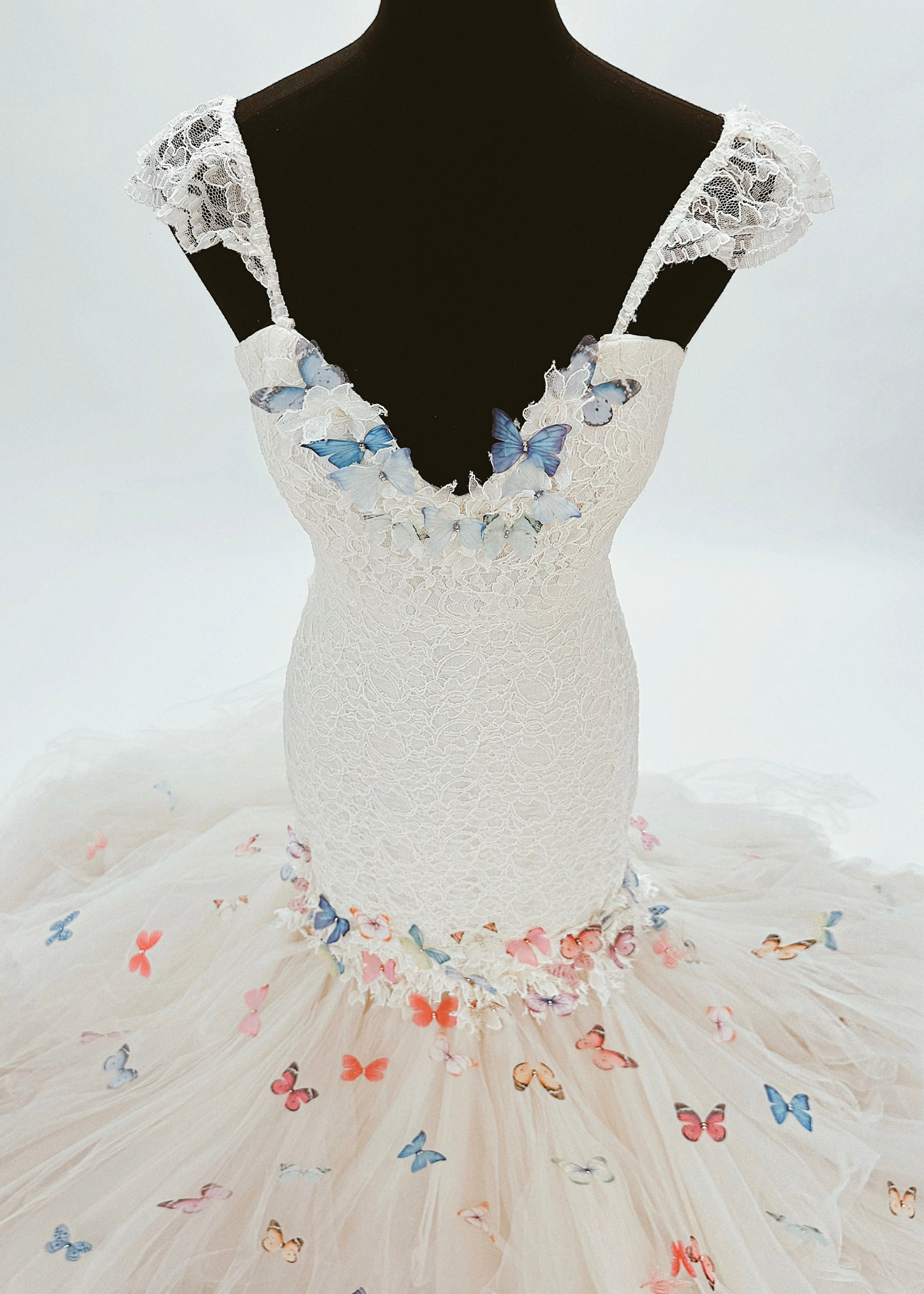 3D organza butterfly detailing on a French corded lace wedding dress by Lauren Elaine