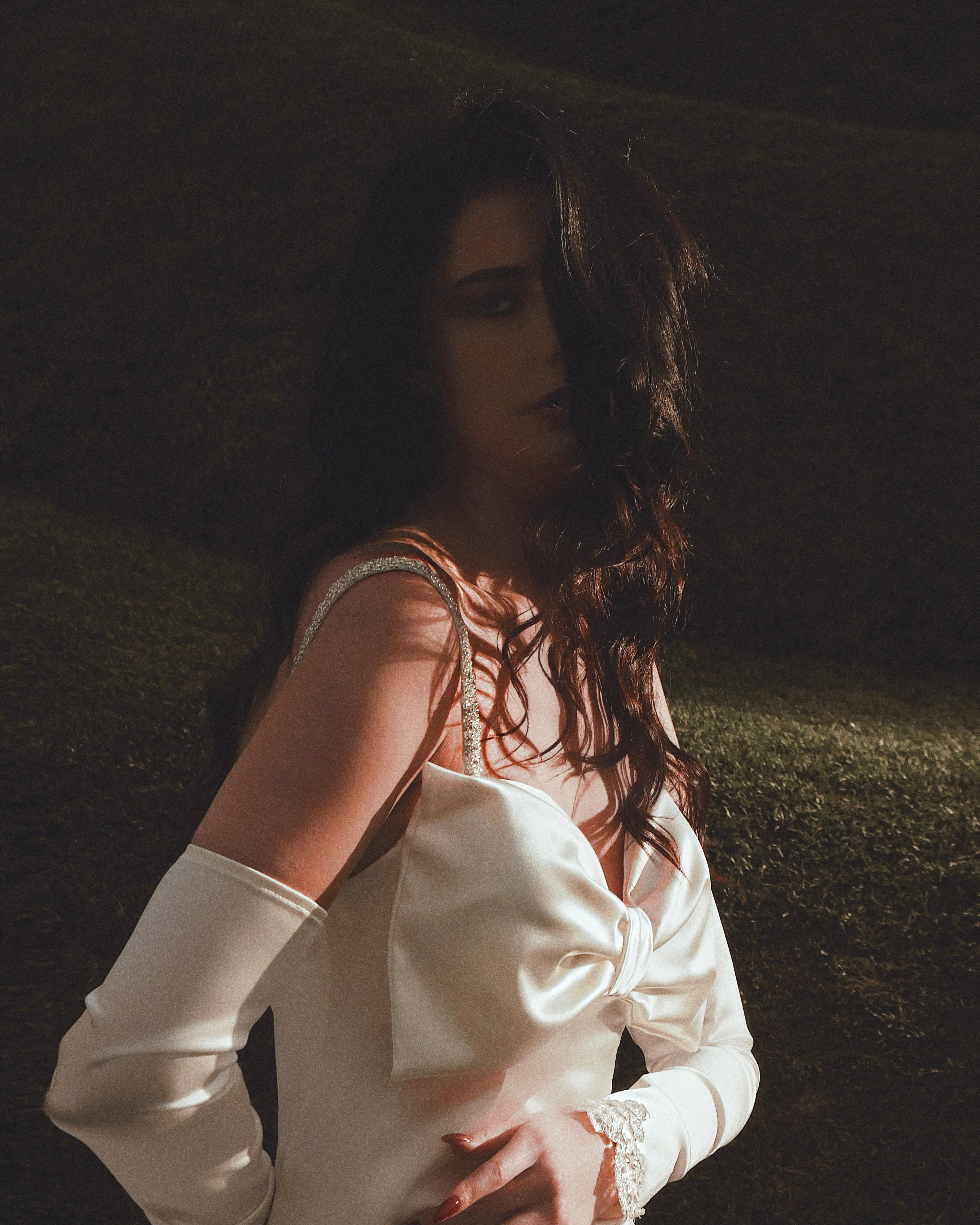 Satin wedding dress with bow in front and crystal straps by Lauren Elaine Los Angeles