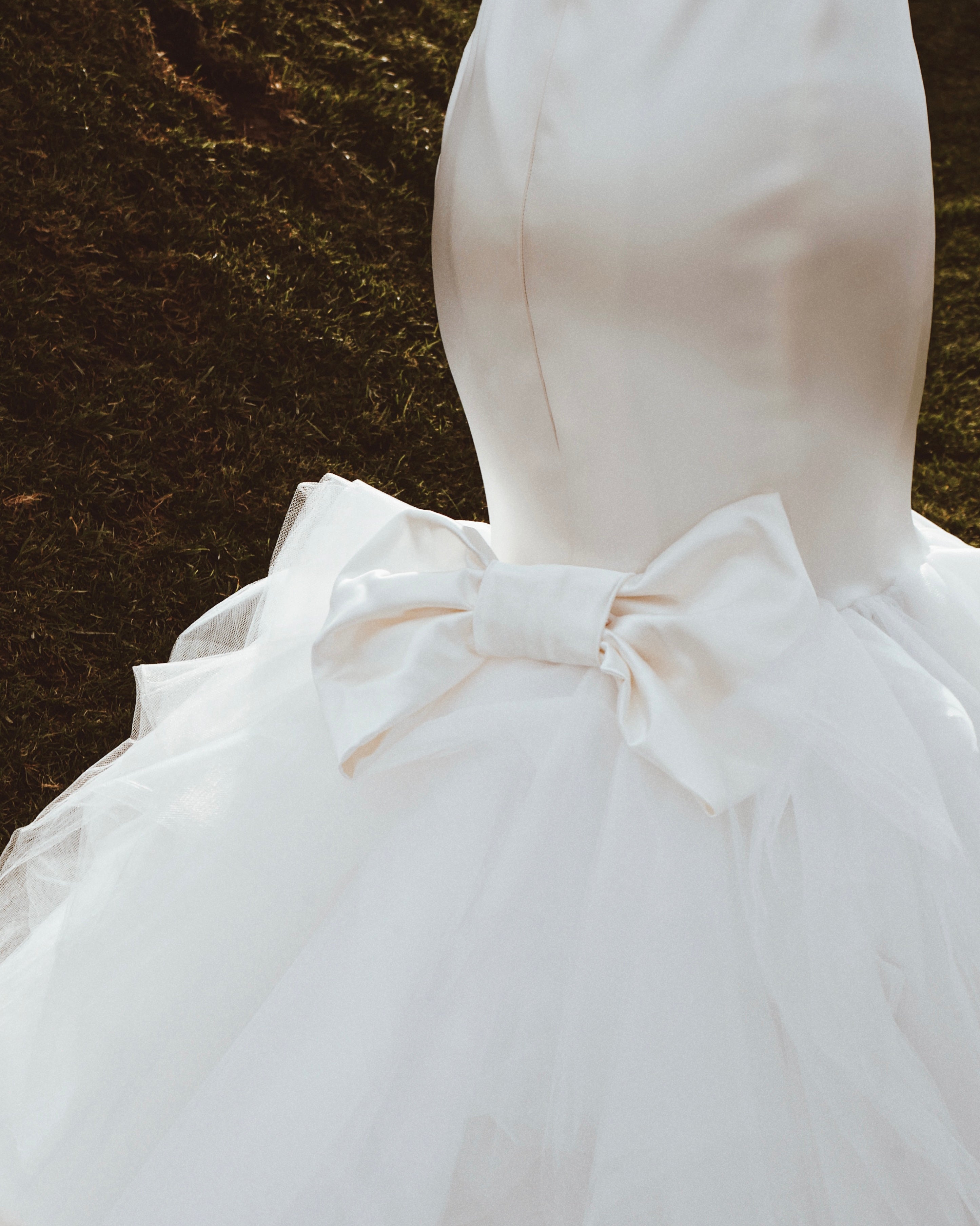Detachable satin bow wedding dresses by Lauren Elaine