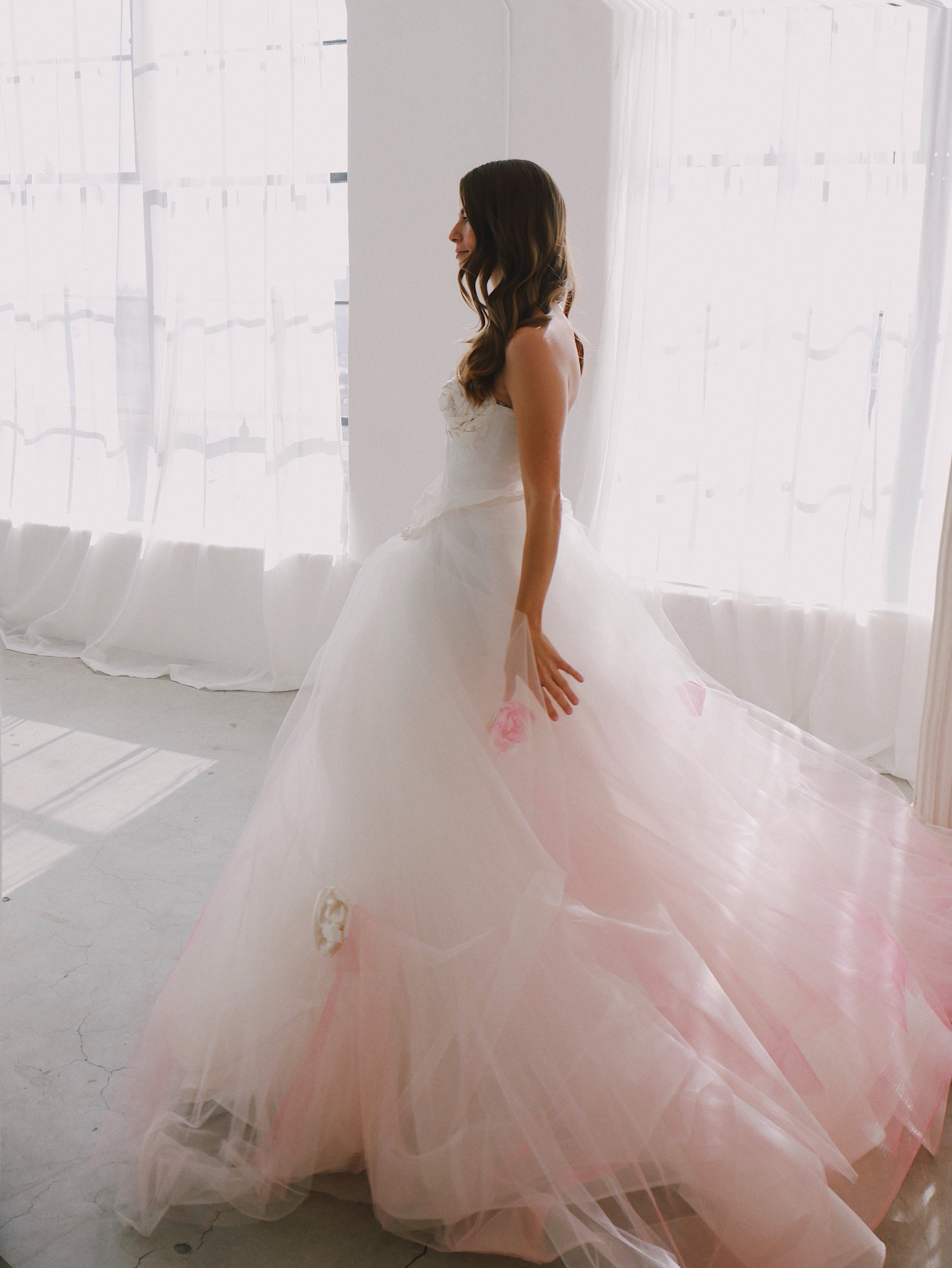 Strapless bustier blush wedding dress