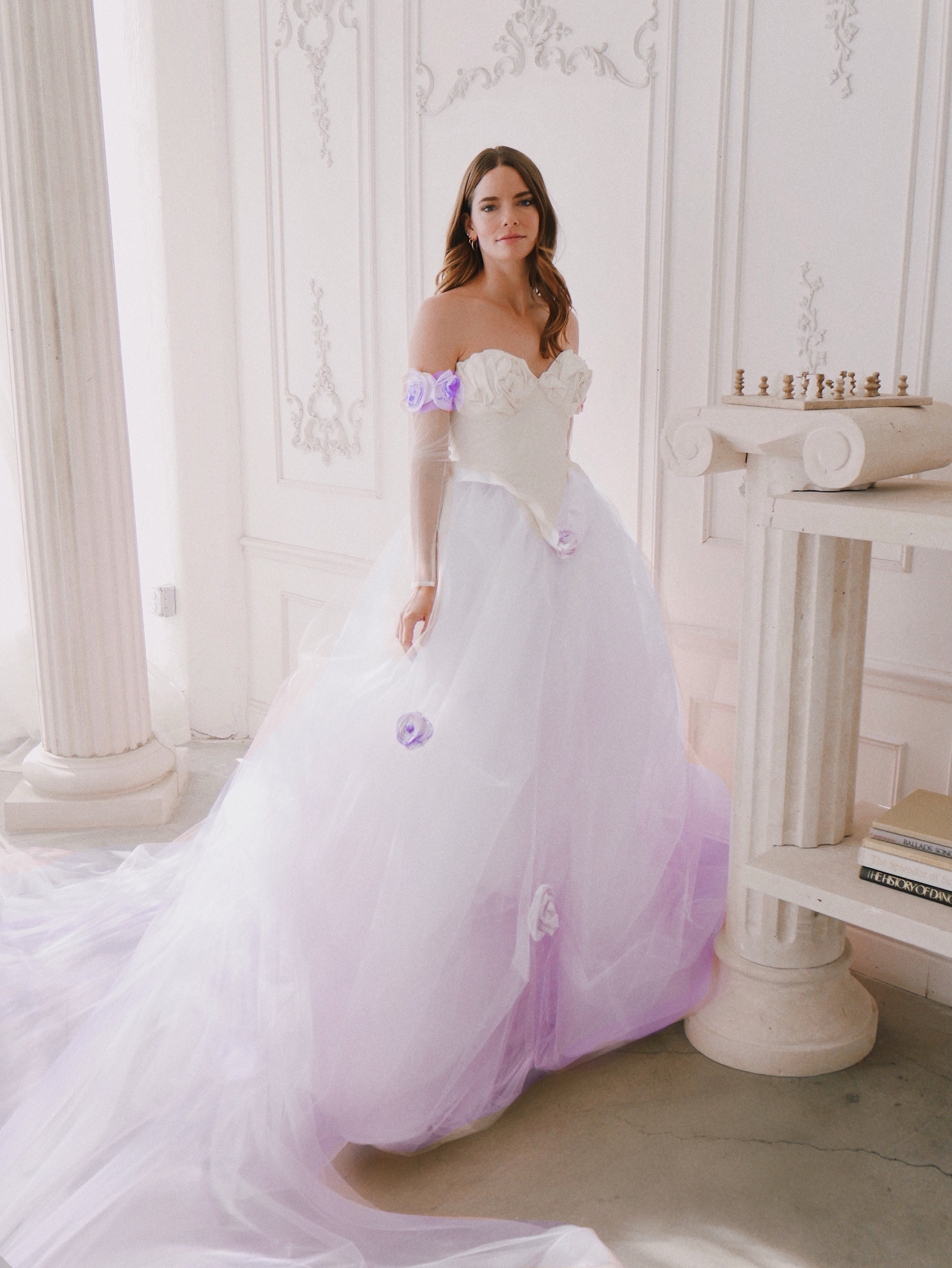 Lavender colored wedding dress with detachable rose bridal sleeves.
