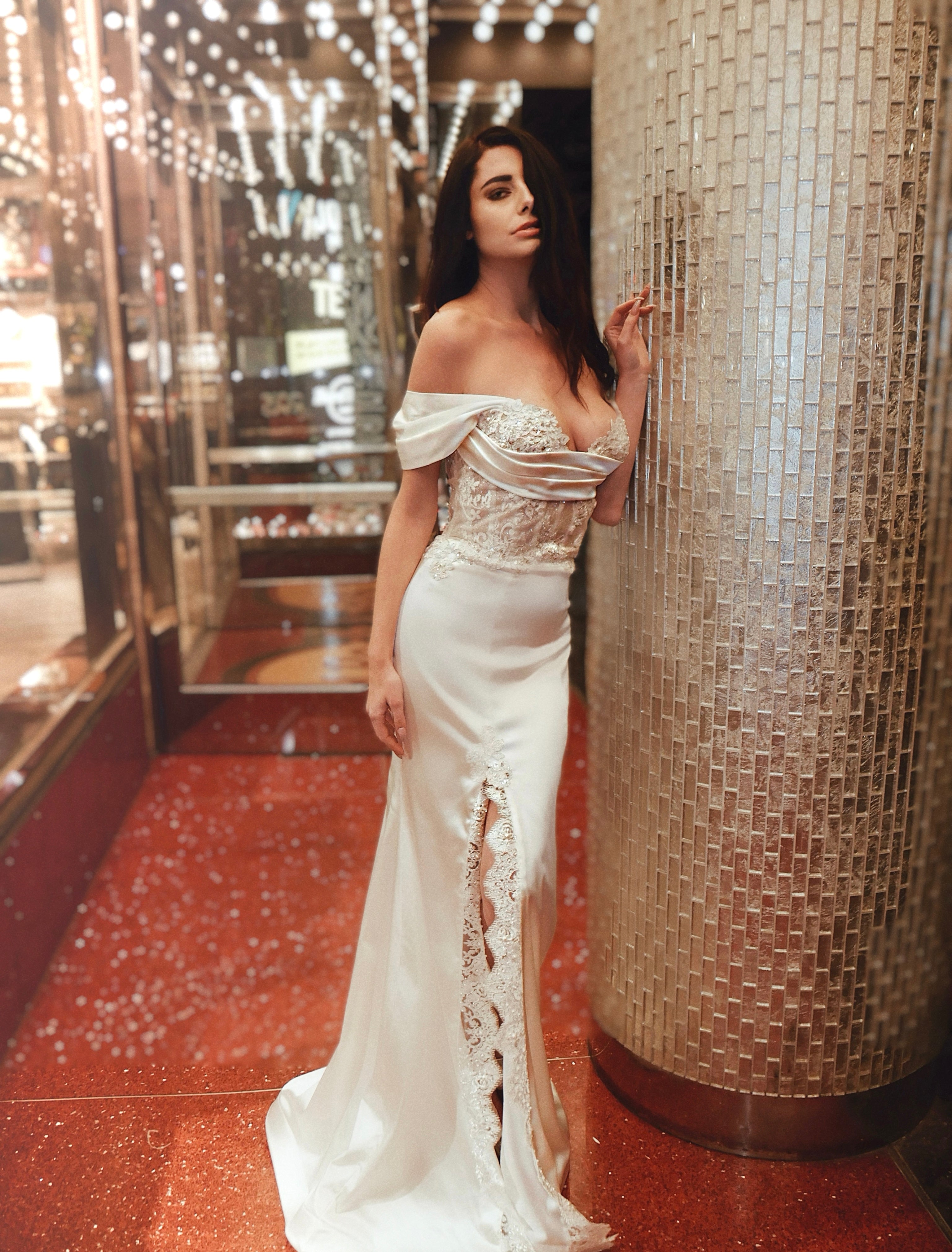 A model stops traffic on Hollywood Blvd in a Lauren Elaine Encore Corset Satin Trumpet Bridal Gown