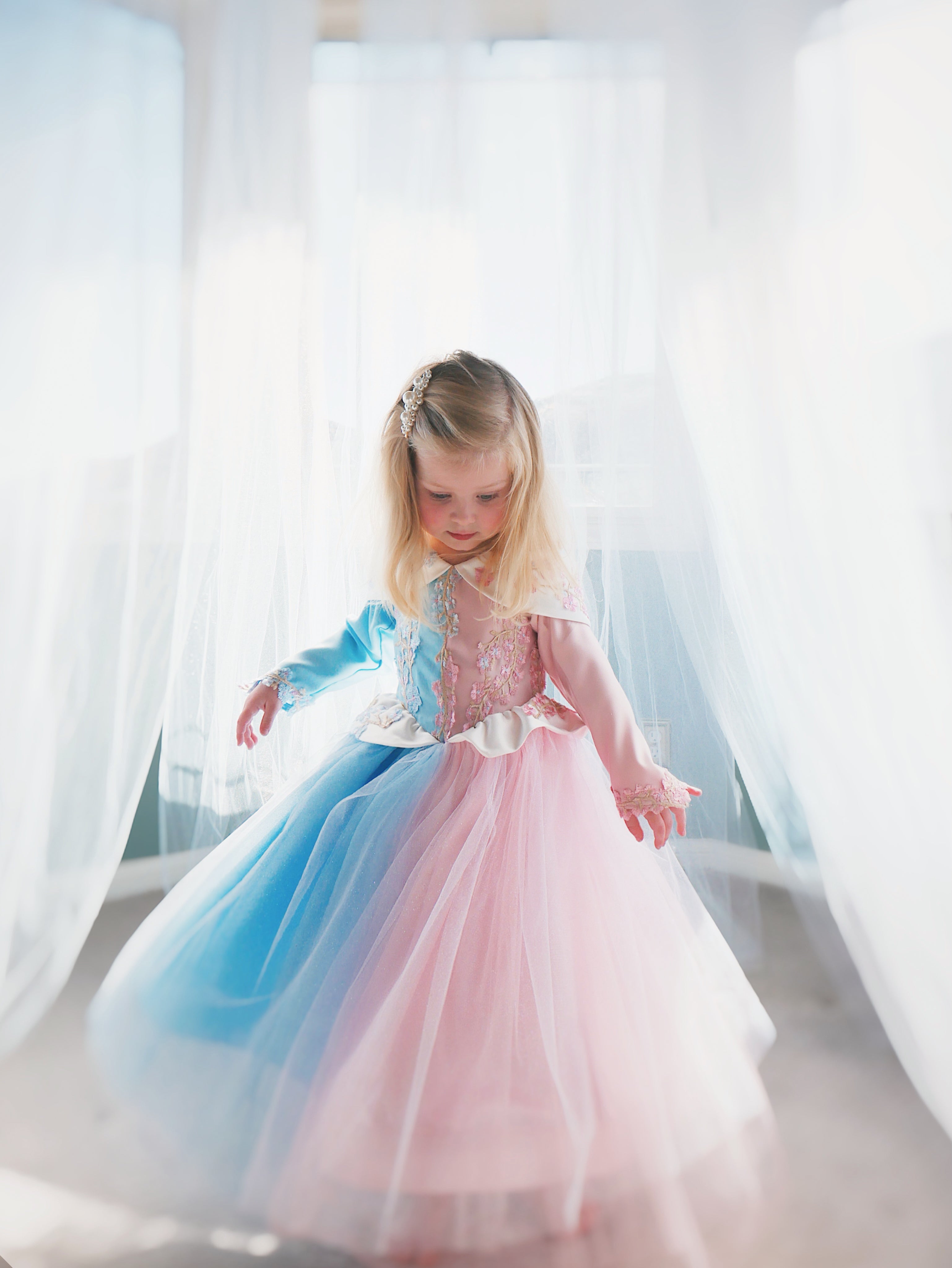 Faire Everlaine wears the Lauren Elaine Sleeping Beauty Princess Dress for toddlers and girls