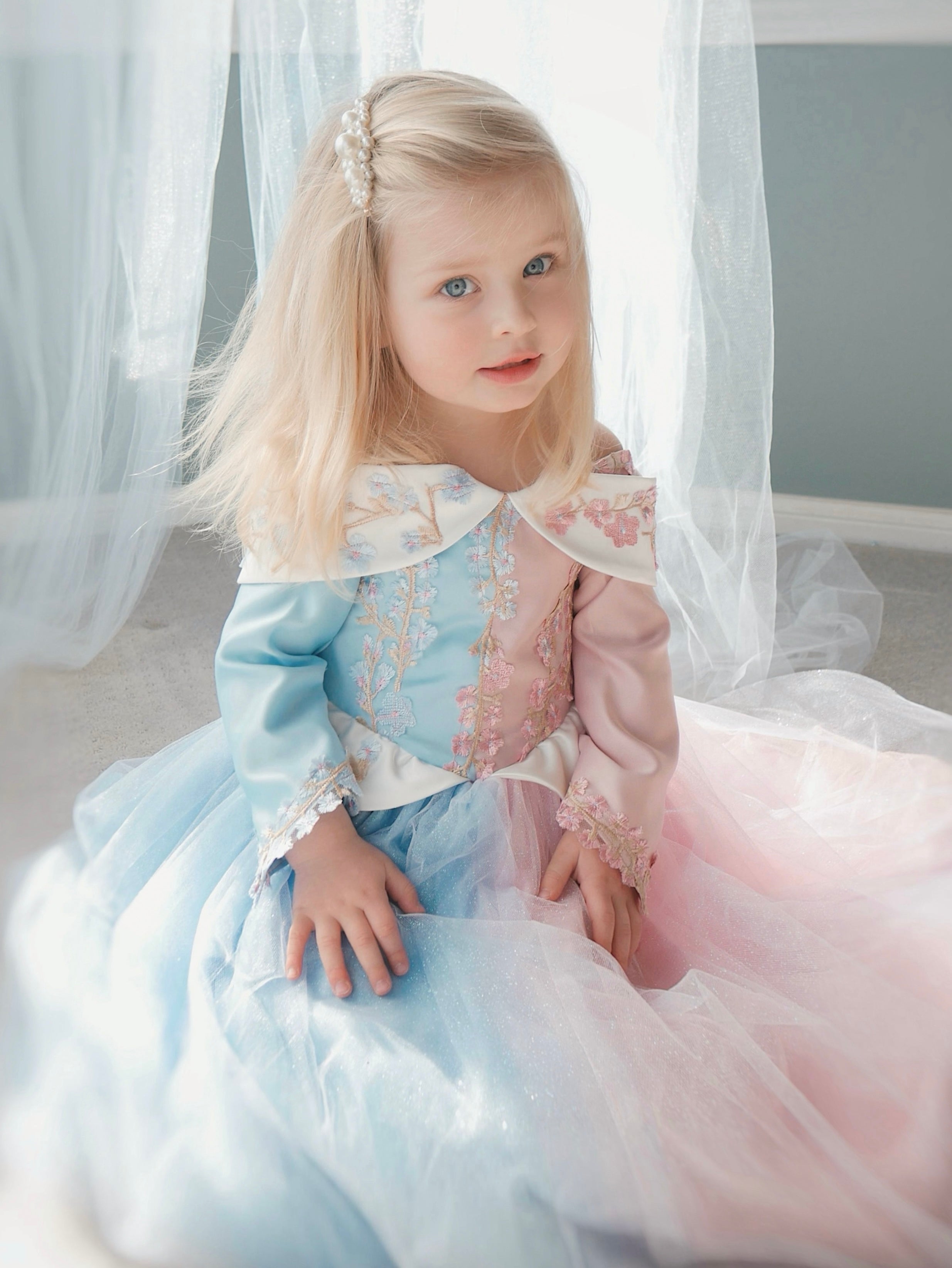 Faire Everlaine wears a Sleeping Beauty Princess Dress for girls by Lauren Elaine