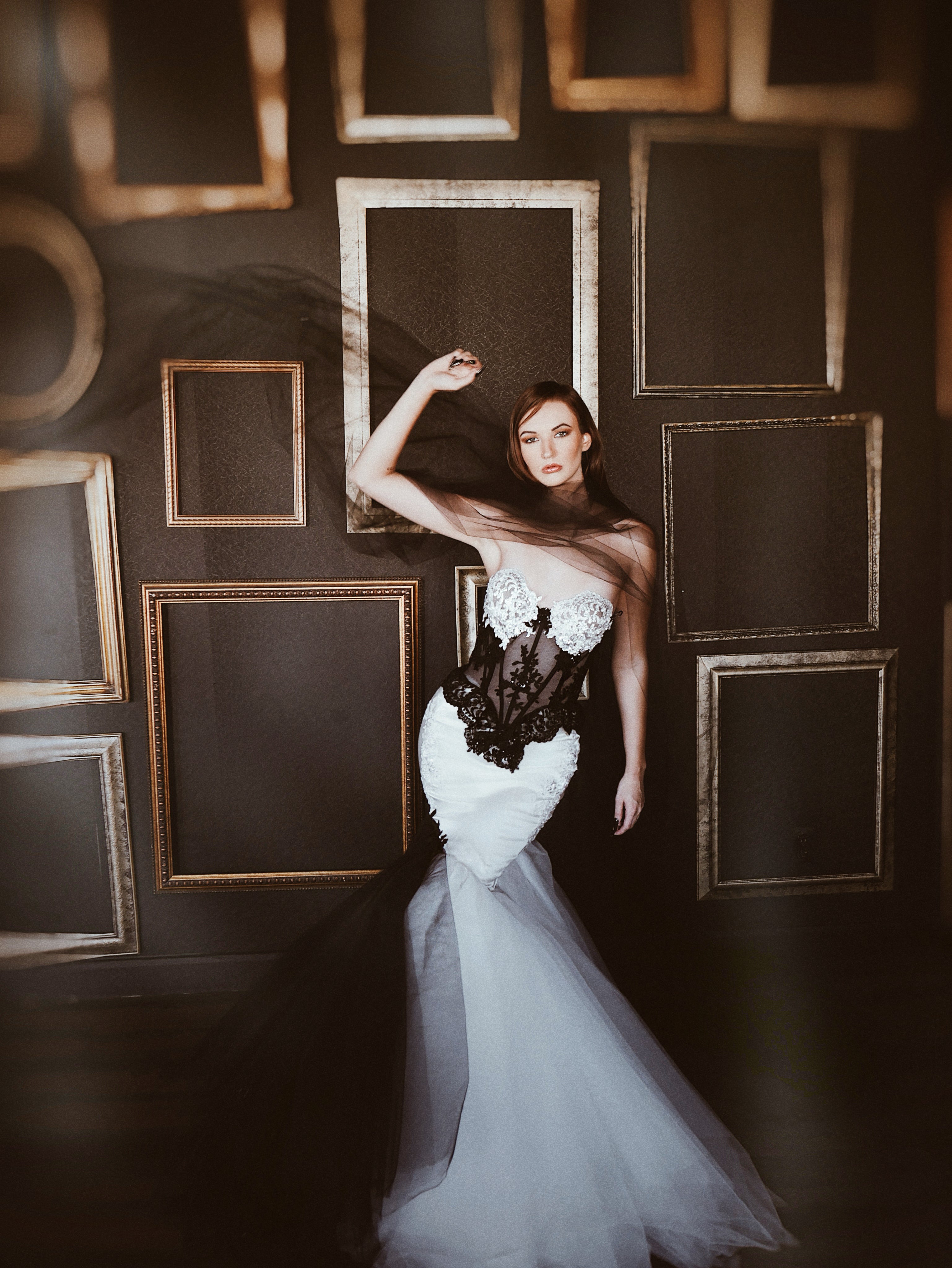 Black and white lace tuxedo Basque waist corset wedding dress for alternative weddings.