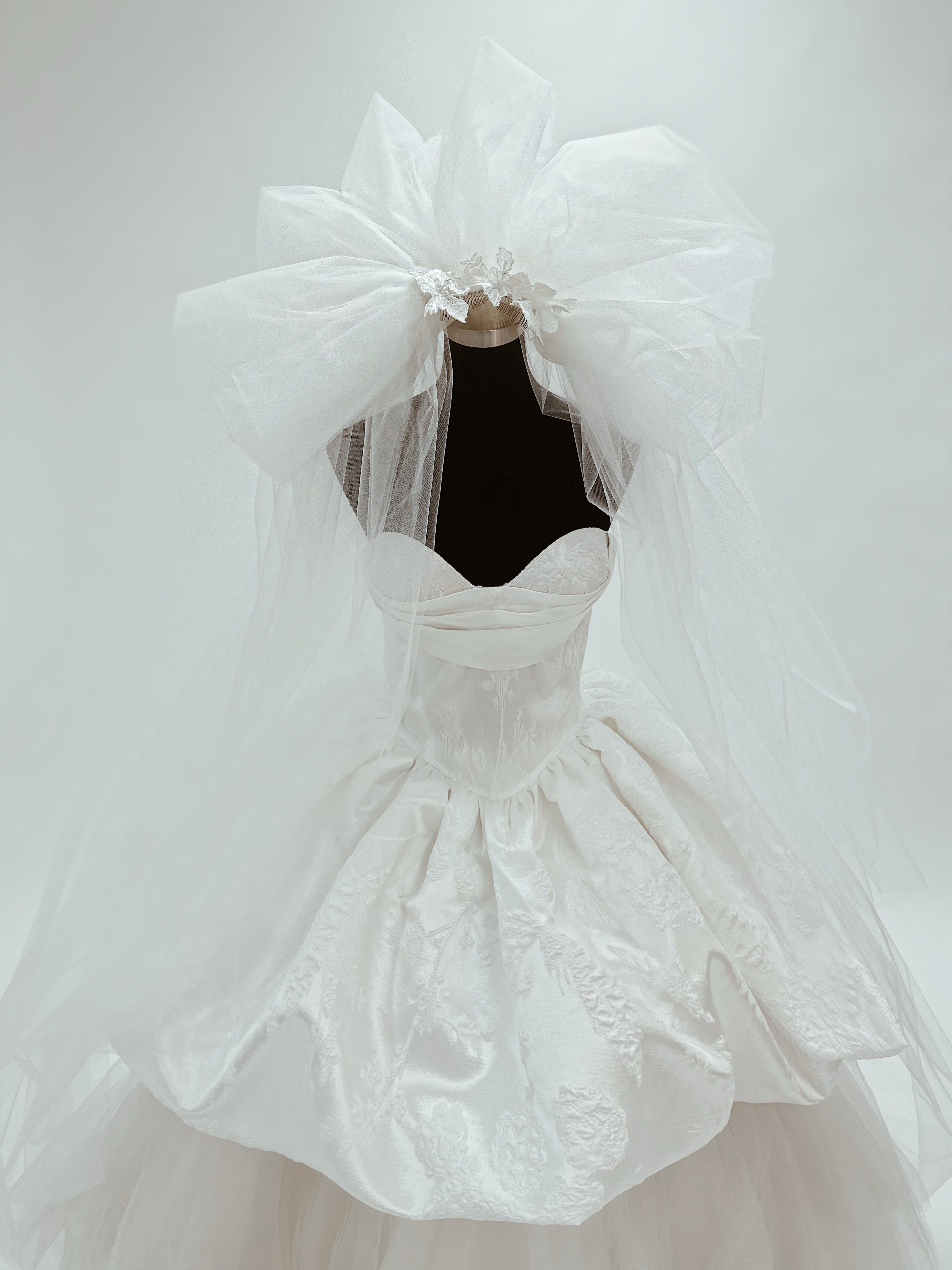 Detail view of the Lauren Elaine "Opus" pouffy tulle wedding veil inspired by 1980s wedding veils.