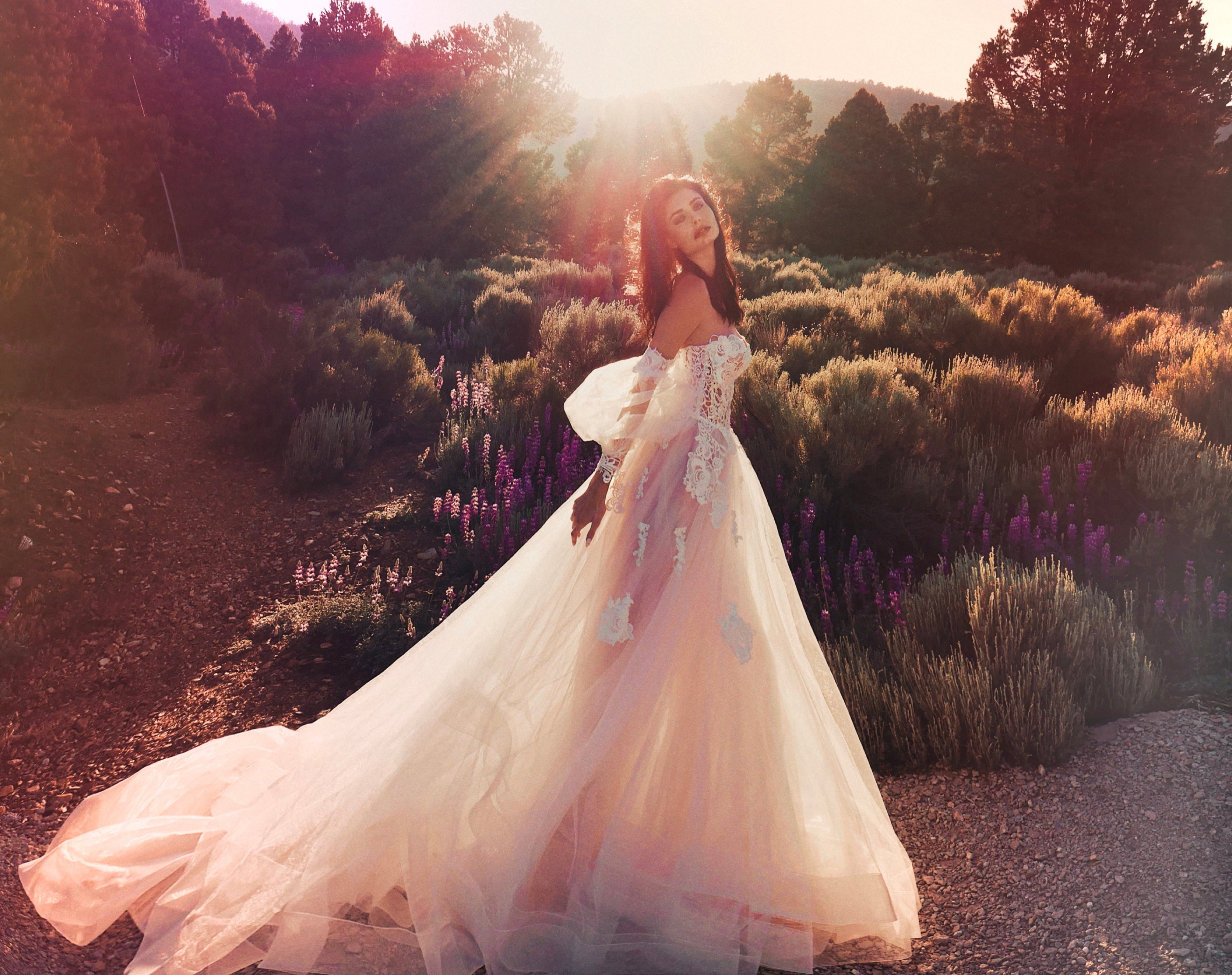 Boho chic corset wedding gown by Lauren Elaine with Detachable Guipure Lace and Tulle Bishop Sleeves