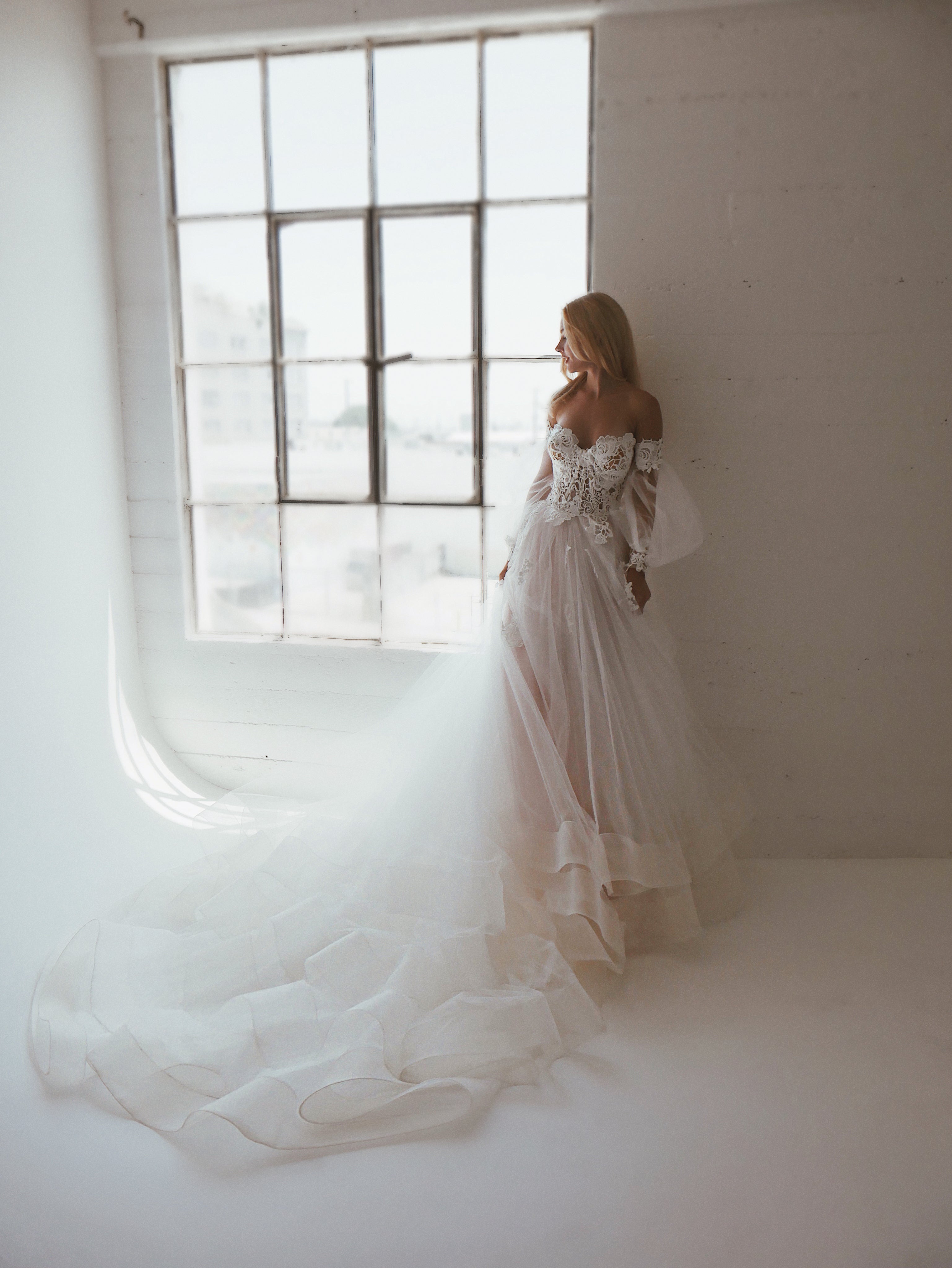 Romantic guipure lace wedding dress with detachable off the shoulder bishop sleeves