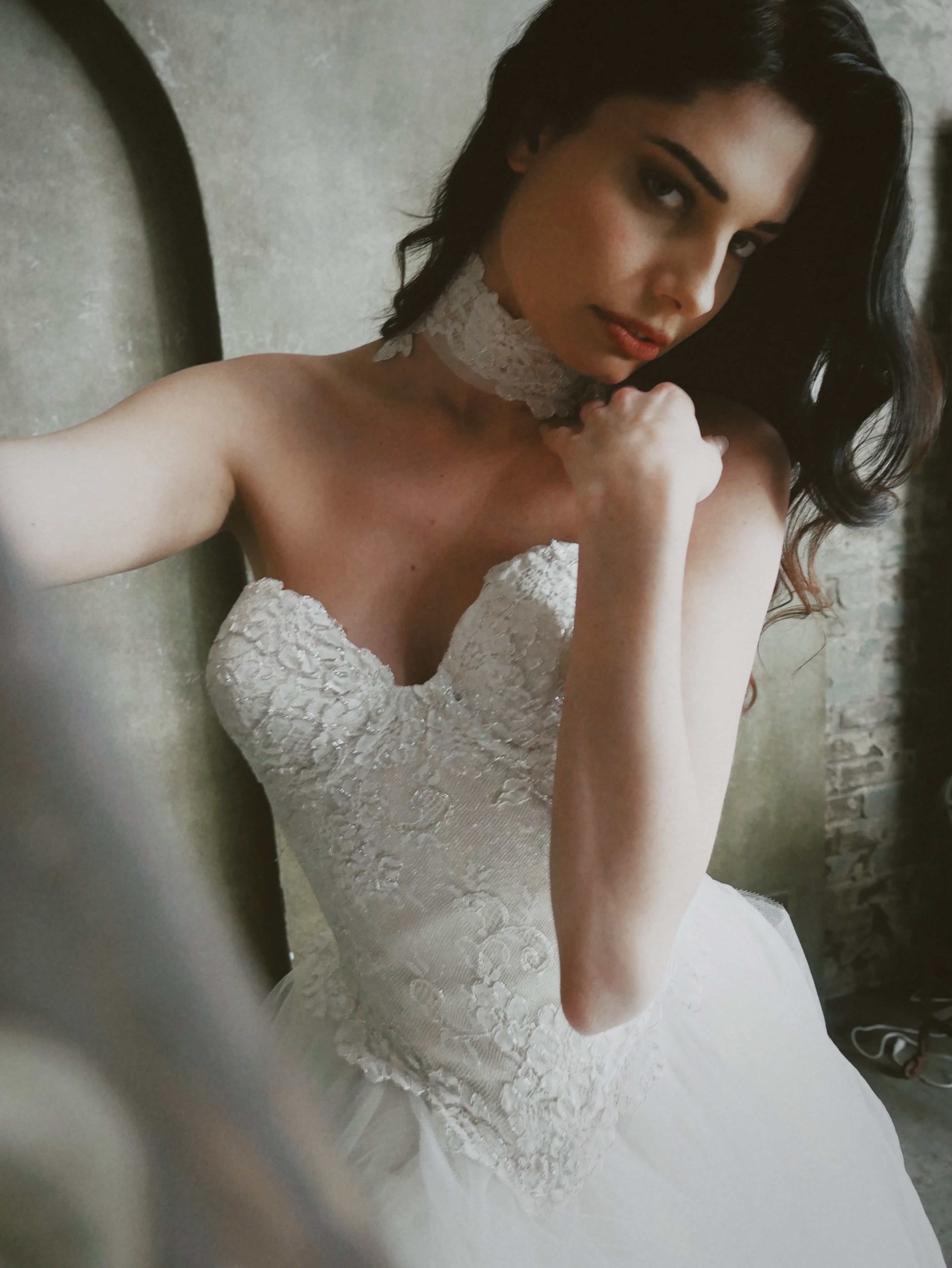 Lace details of a model posing in a Chantilly Lace Bridal Choker by Lauren Ela