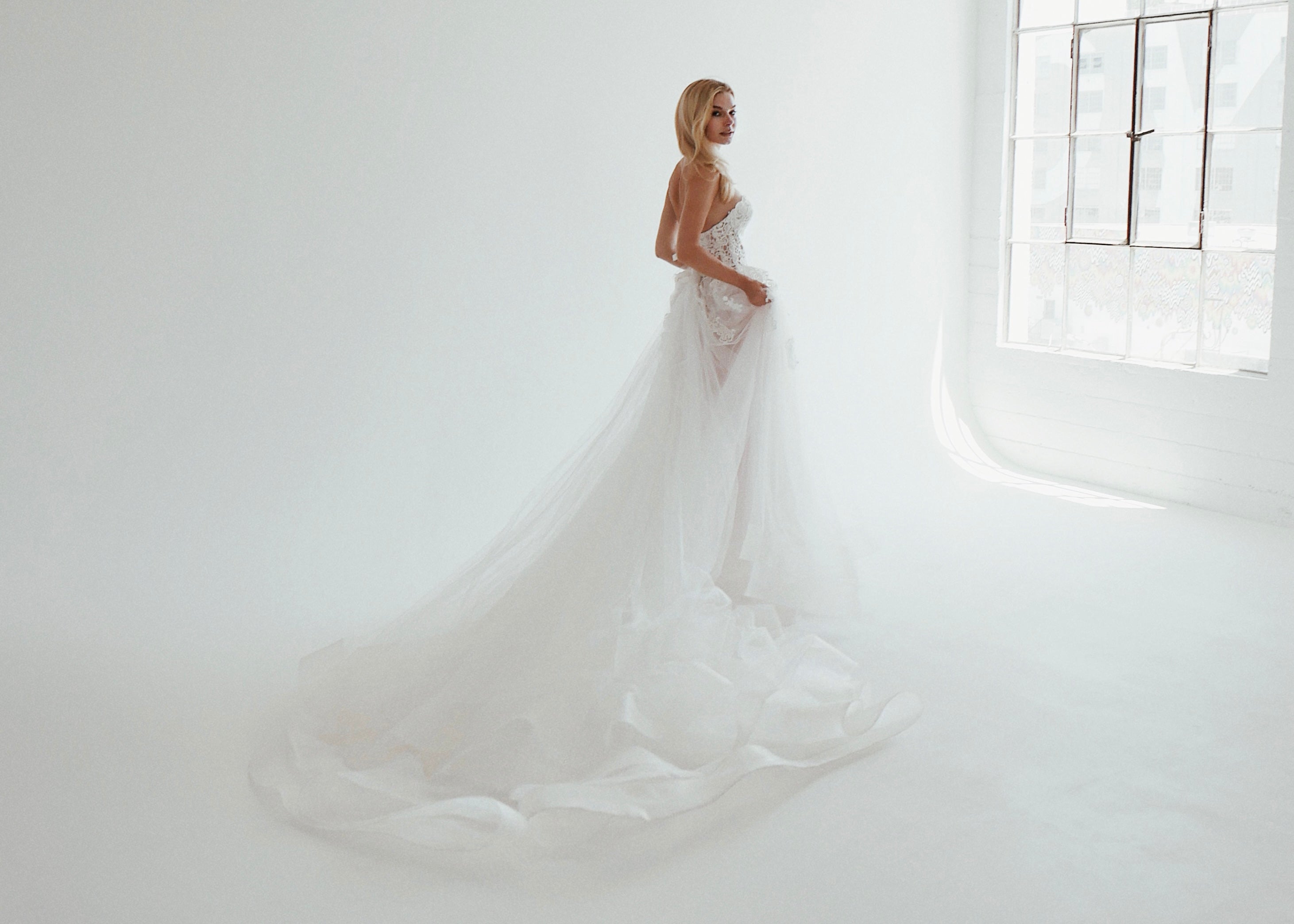A model wears the Lauren Elaine Pastora gown in a studio in downtown Los Angeles