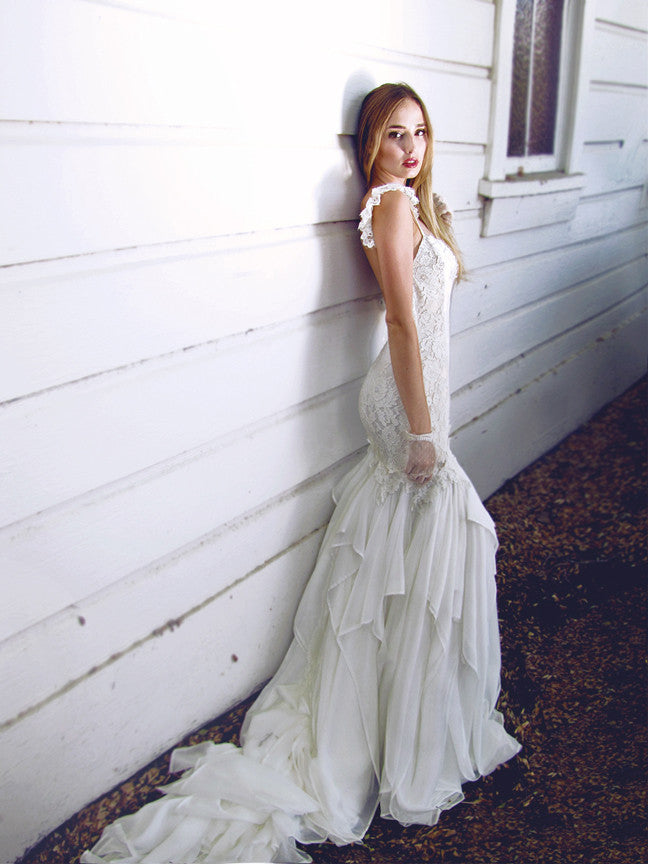 Chiffon and lace backless mermaid wedding gown by Lauren Elaine. Romantic and bohemian lace ruffle sleeves and chiffon petal train.