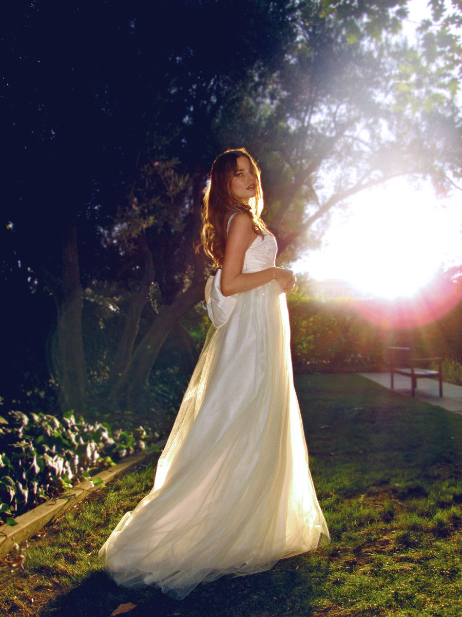 Tulle and lace dress with bow and open back. Made in the USA.