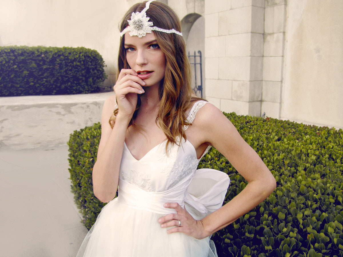 Lace and tulle bridal gown, corset lace bodice, oversized bow, open back, lingerie lace straps