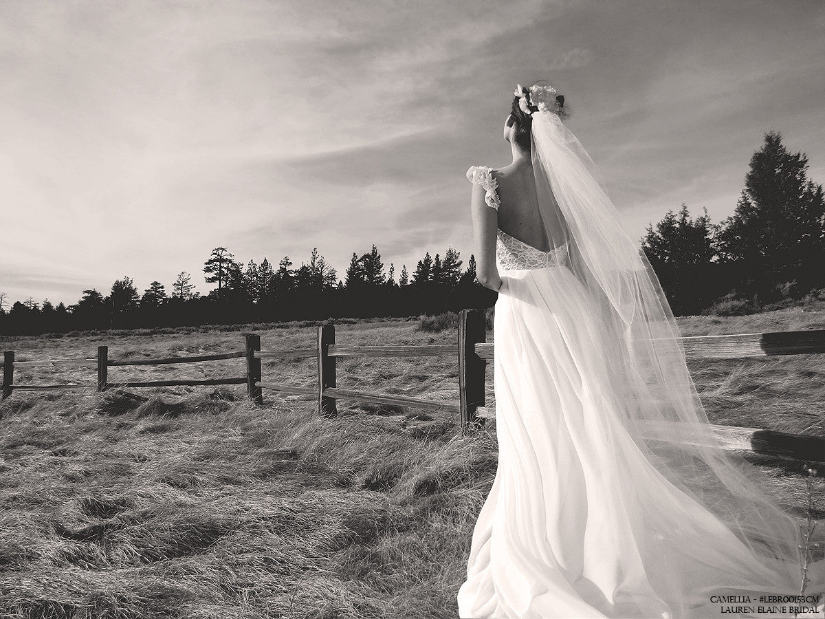 Bohemian capped sleeve bridal gown by Lauren Elaine Bridal. Whimsical wedding gowns.