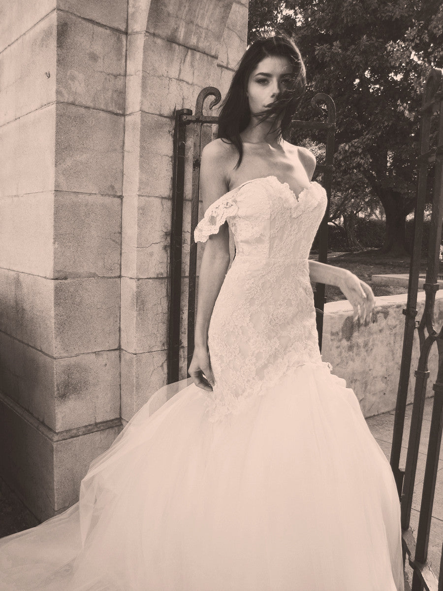 Off-the-shoulder mermaid wedding gown with tulle skirt and romantic, bohemian feel