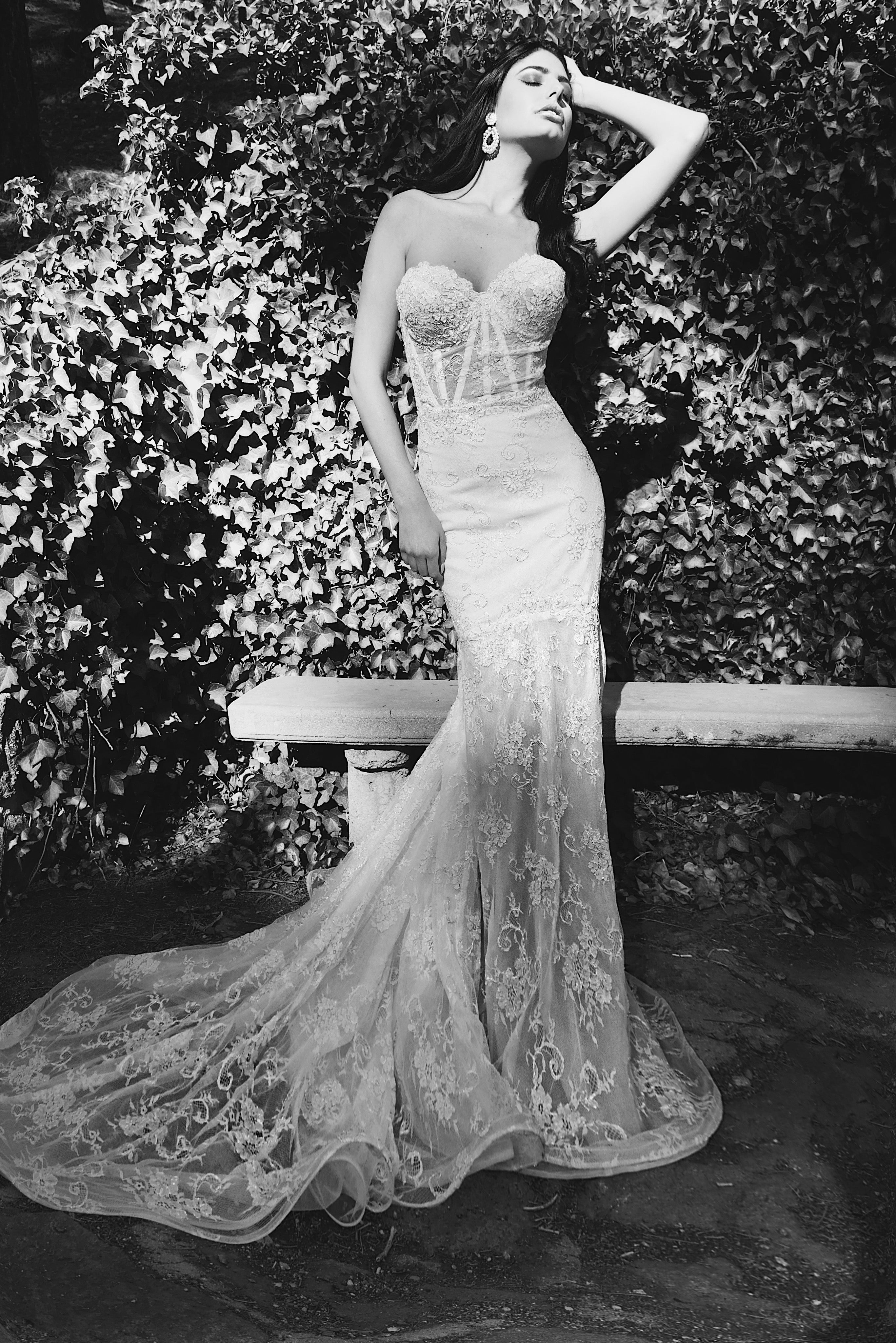 Black and white image of chantilly lace wedding dress with corset bodice in blush