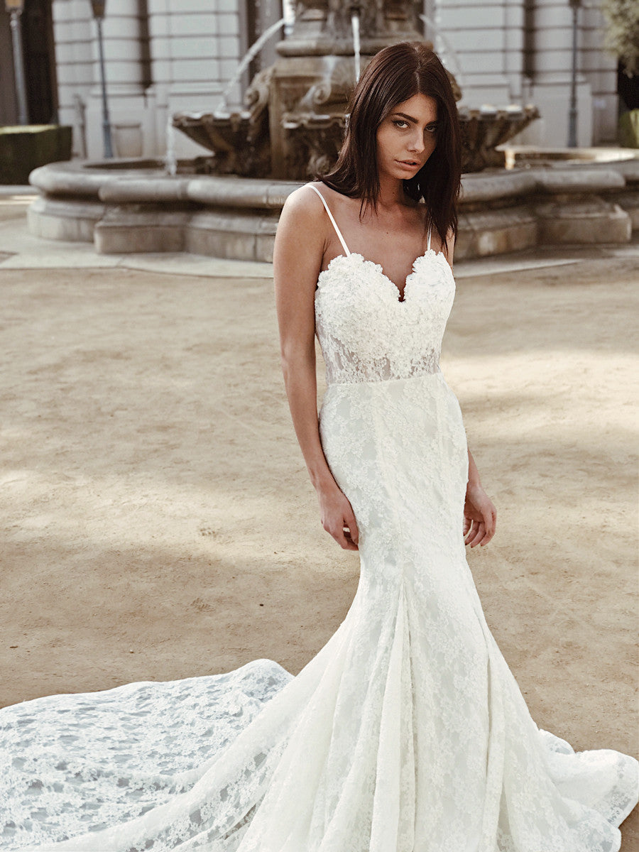 Sexy sweetheart illusion naked wedding gown with floral appliqués and spaghetti straps by Lauren Elaine Bridal.