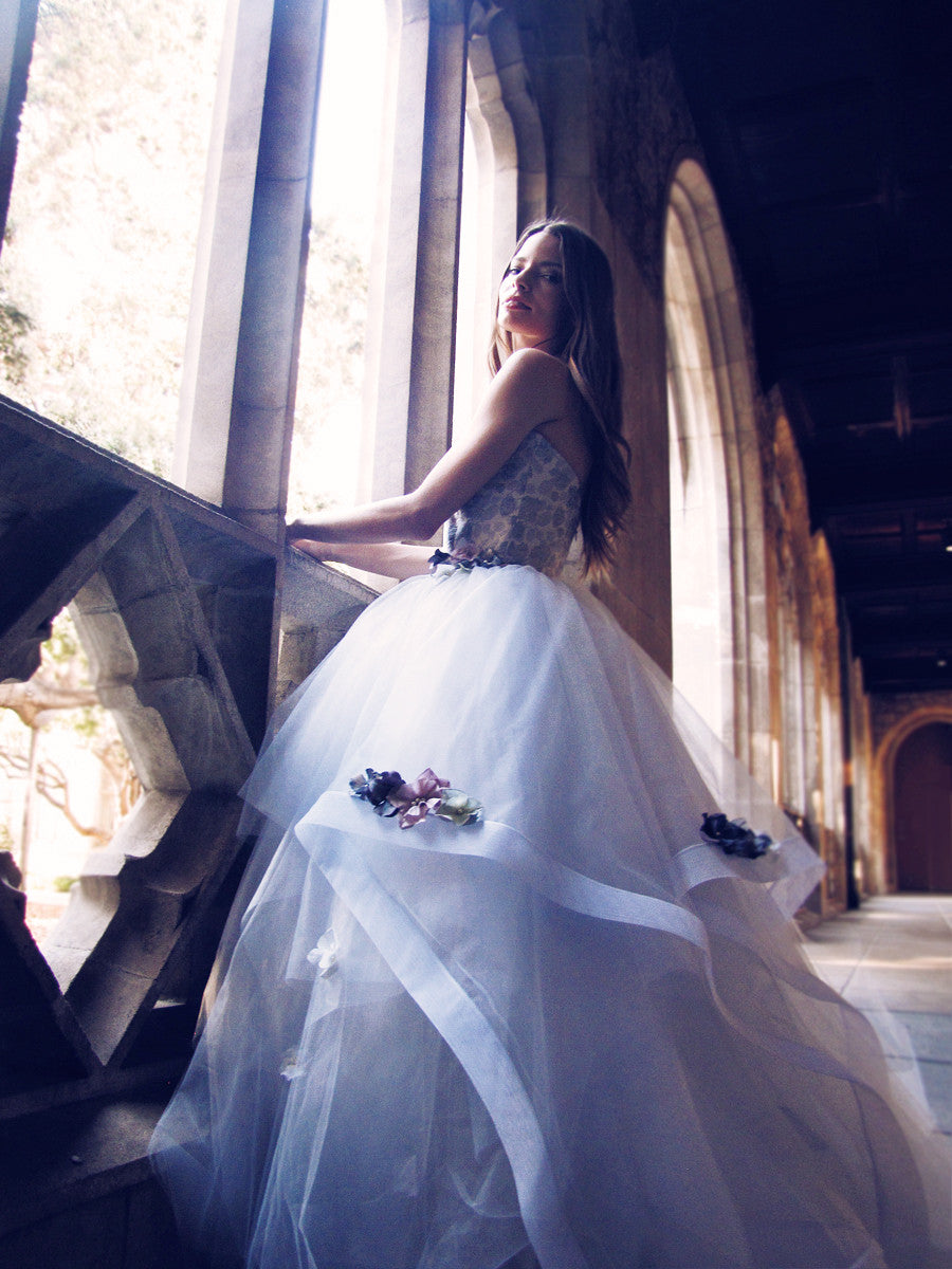Fleur by Lauren Elaine Ball Gown wedding dress with horsehair petals and flower detailing in blue pewter mist color option with crystals and pearls.
