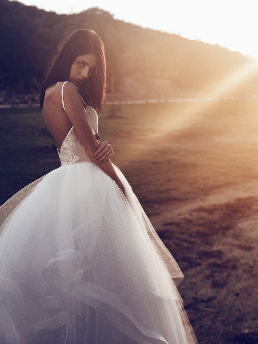 Open back tulle and horsehair wedding dress ball gown with spaghetti straps and layered twirl skirt