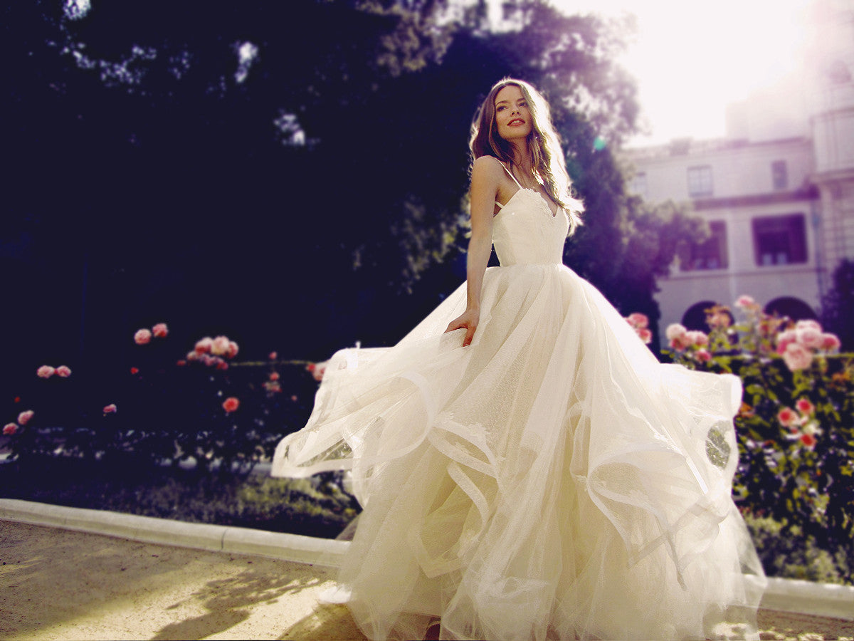 Twirling in the Magnolia wedding dress by Designer Lauren Elaine
