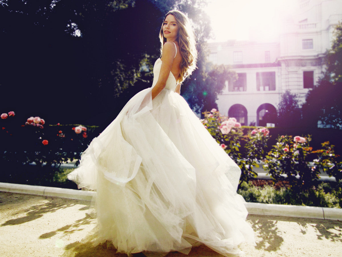 Wedding dresses and gowns made for twirling. Magnolia by Lauren Elaine.