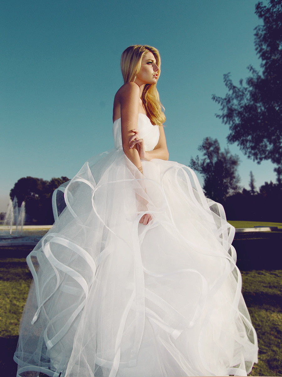 Full length image of a model wearing Lauren Elaine Lotus Gown with horsehair and tulle skirt.