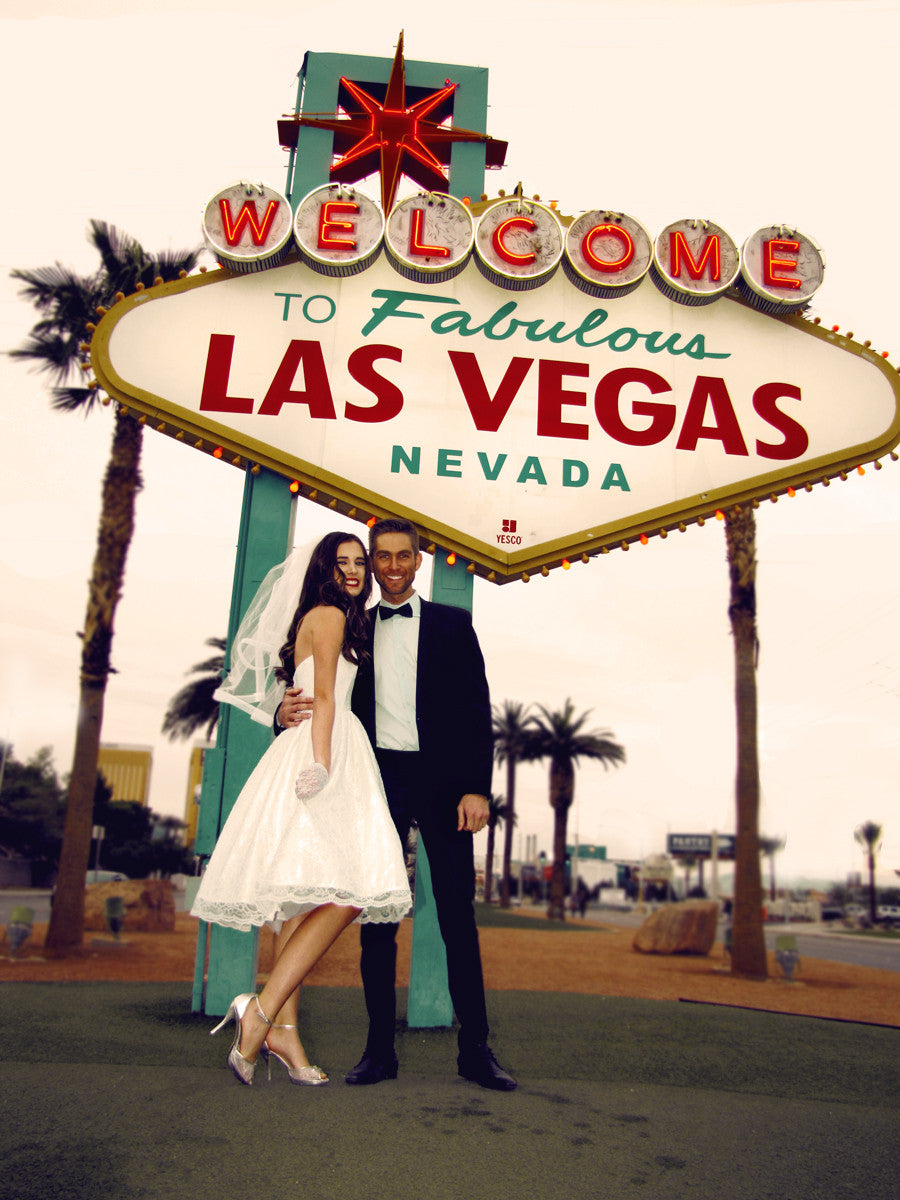 Affordable reception wedding dresses. A-line vintage 1950's lace bridal gown.