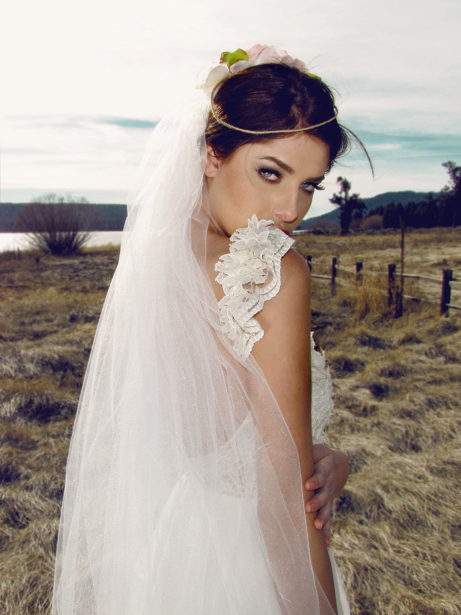 Ruffled lace sleeve wedding dress with pearls. Lauren Elaine Camellia gown. Made in the USA. Affordable Designer bridal.