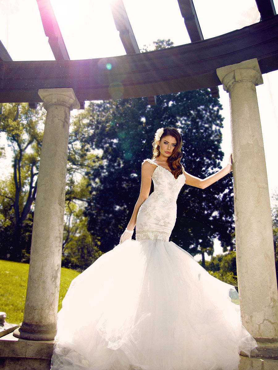 Princess wedding dresses by Lauren Elaine Bridal. Backless mermaid wedding dress.