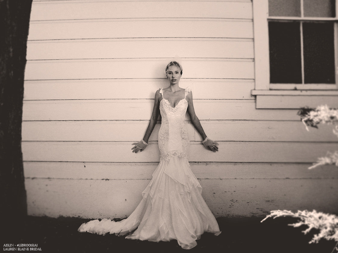 Lace and chiffon mermaid wedding gown.