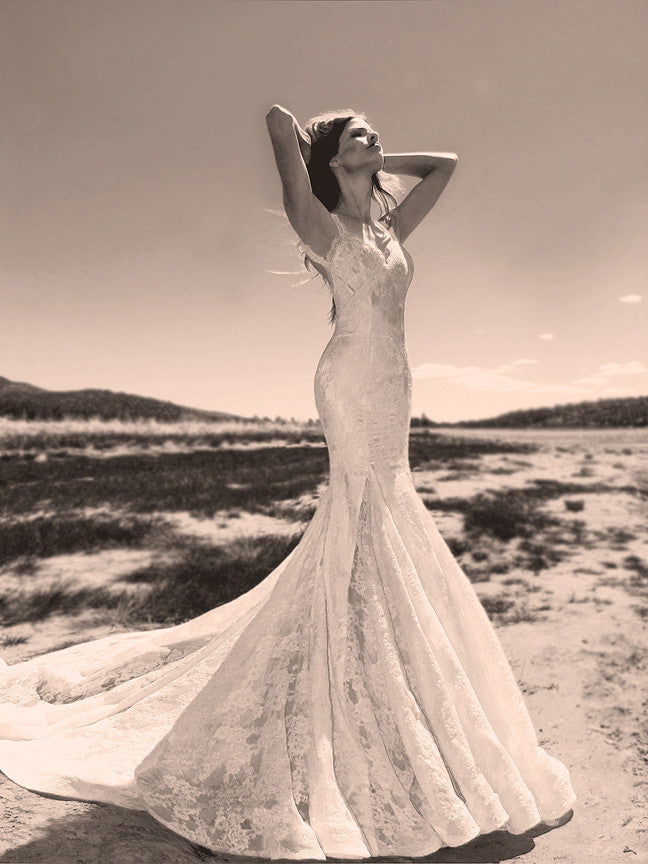 Backless lace mermaid wedding gown with scallop lace detailing by Lauren Elaine.