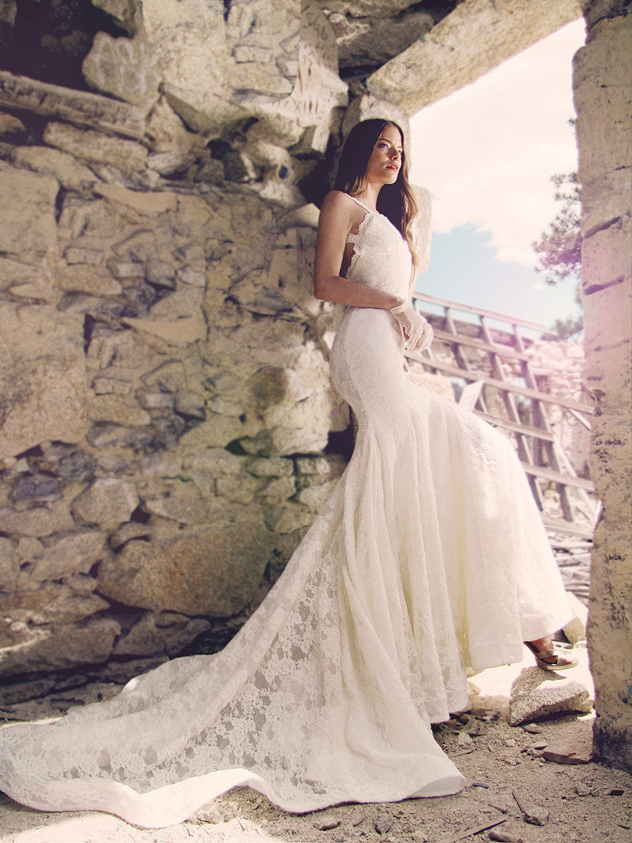 Backless lace mermaid wedding gown with full cathedral train and horsehair braid hemline by Lauren Elaine Bridal