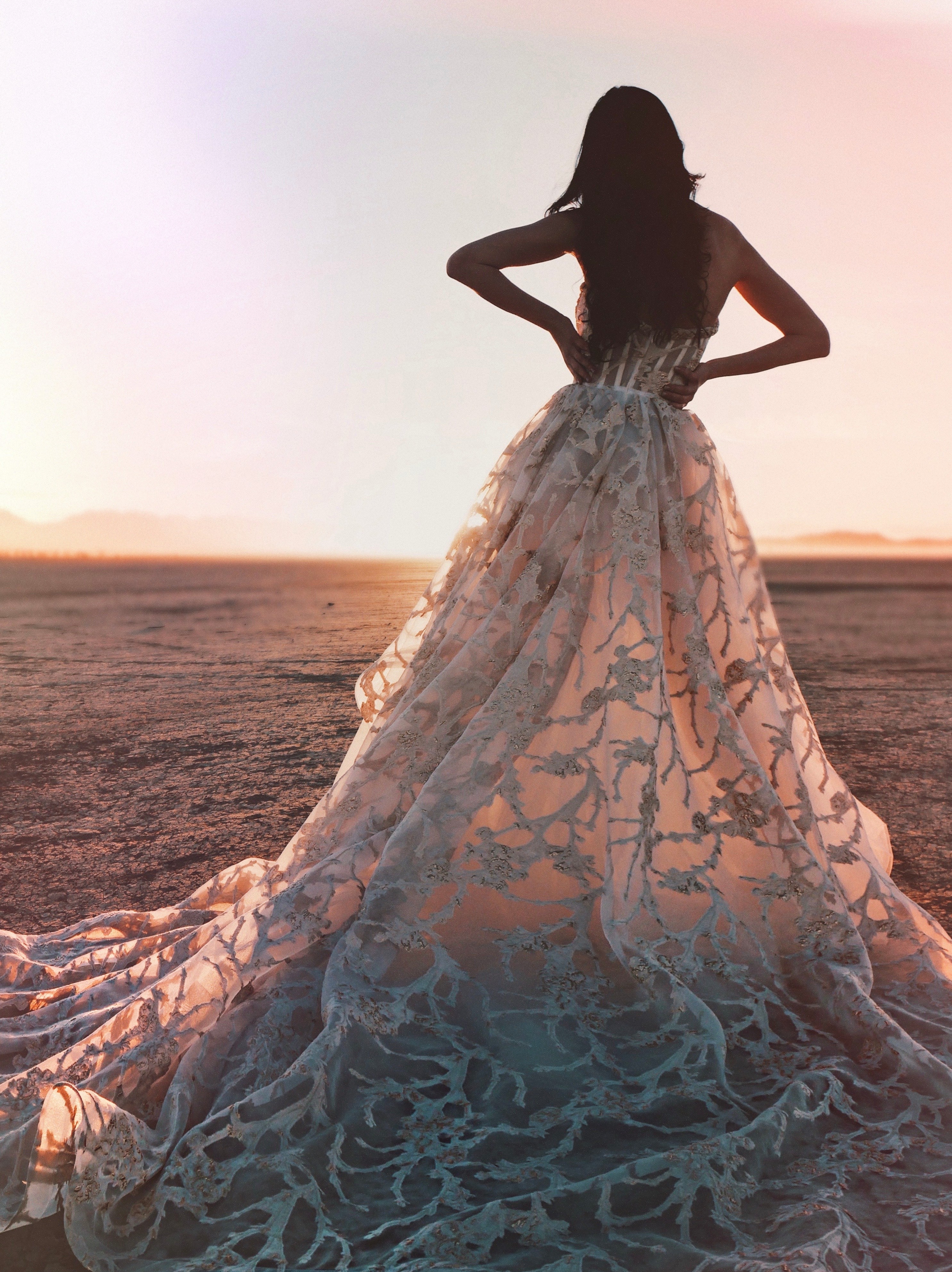 White and gold corset ball gown wedding dress with textured skirt