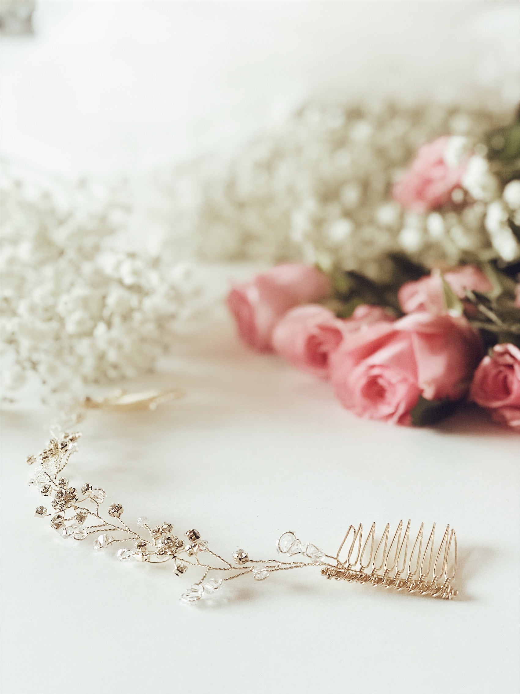The "Laurel" bridla hair vine and tiara flower crown with swarovski crystal details from Lauren Elaine Bridal Accessories