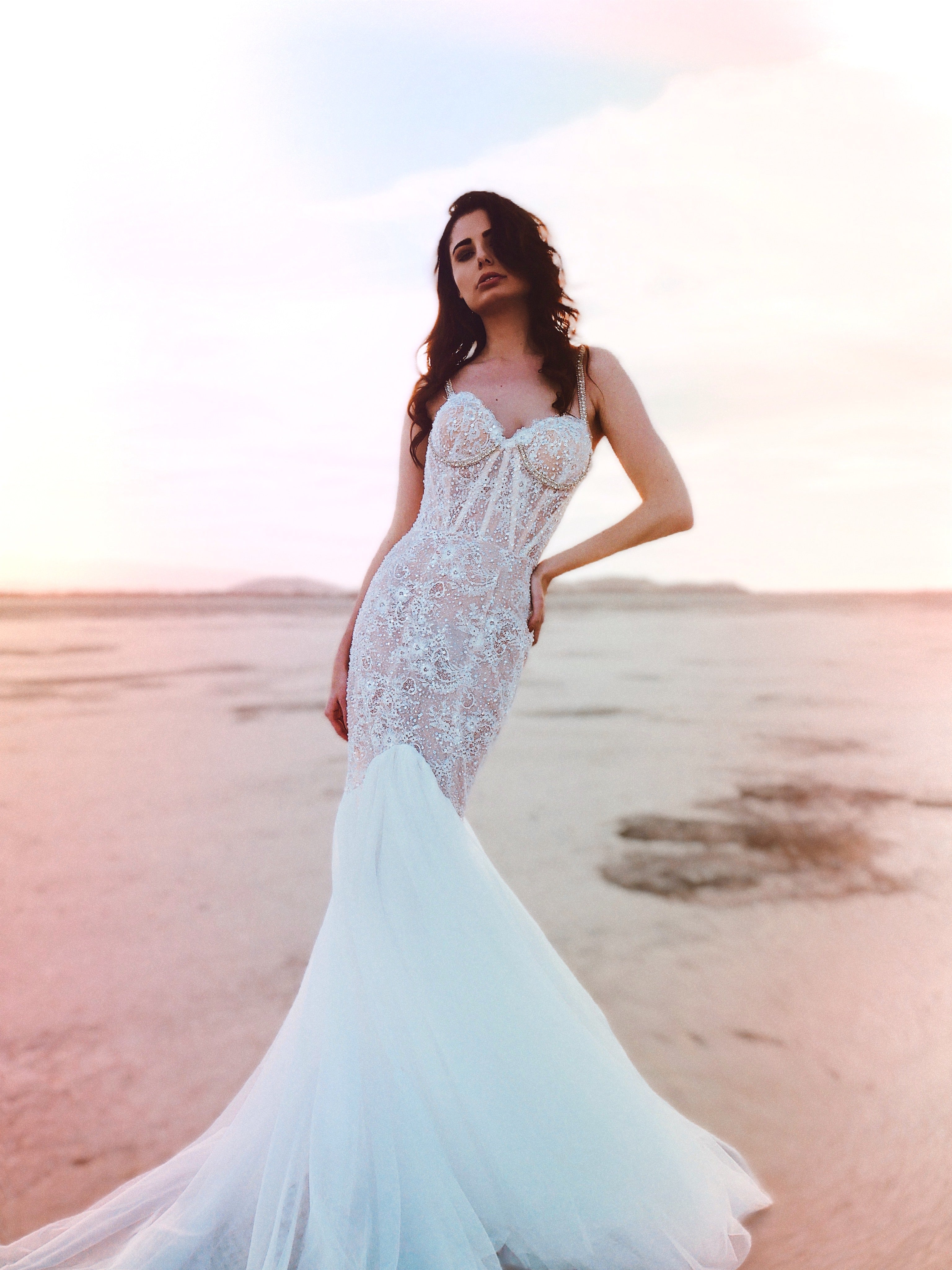 Wide shot of mermaid wedding dress with long train