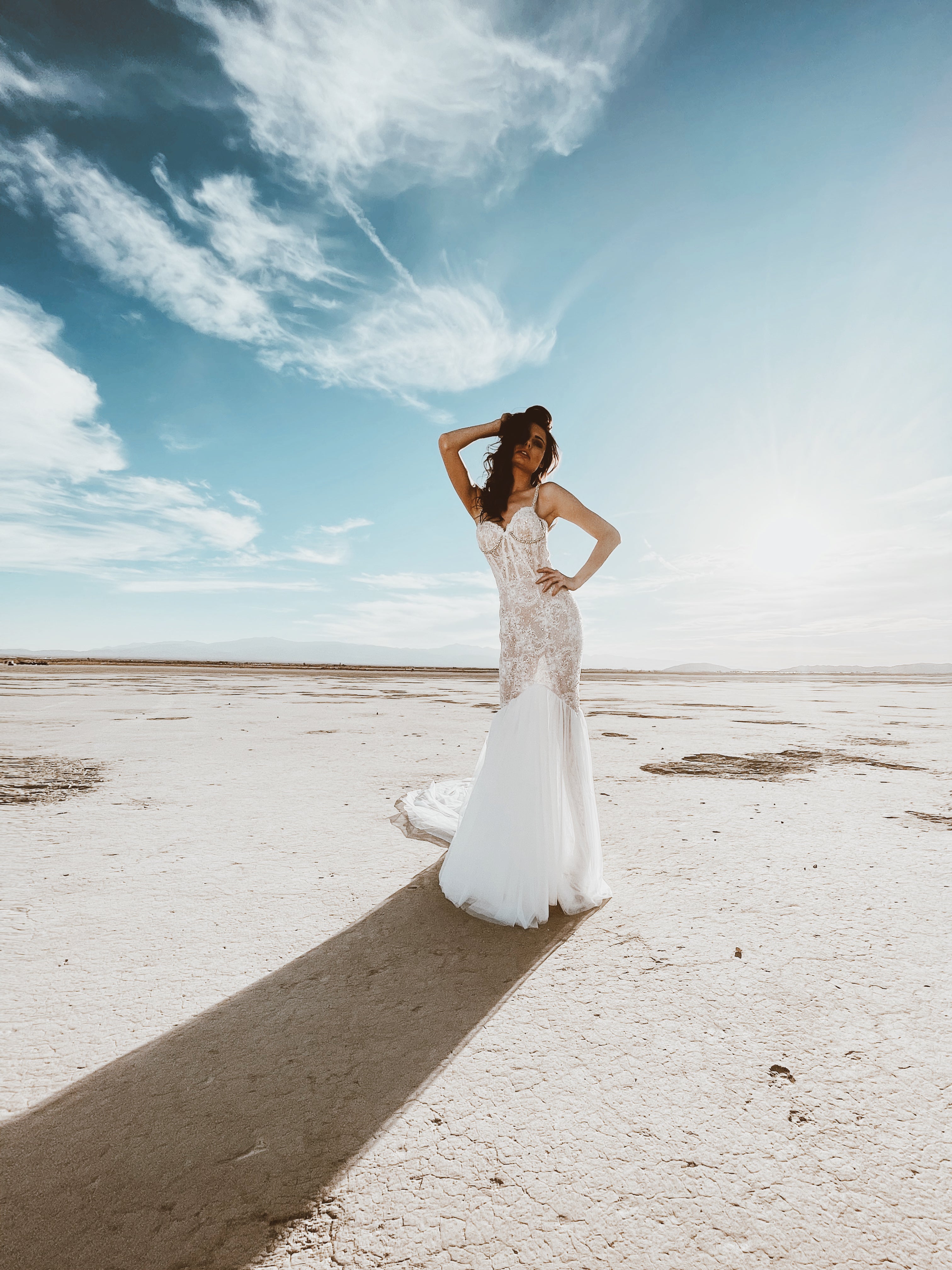Long shot of white mermaid corset wedding dress