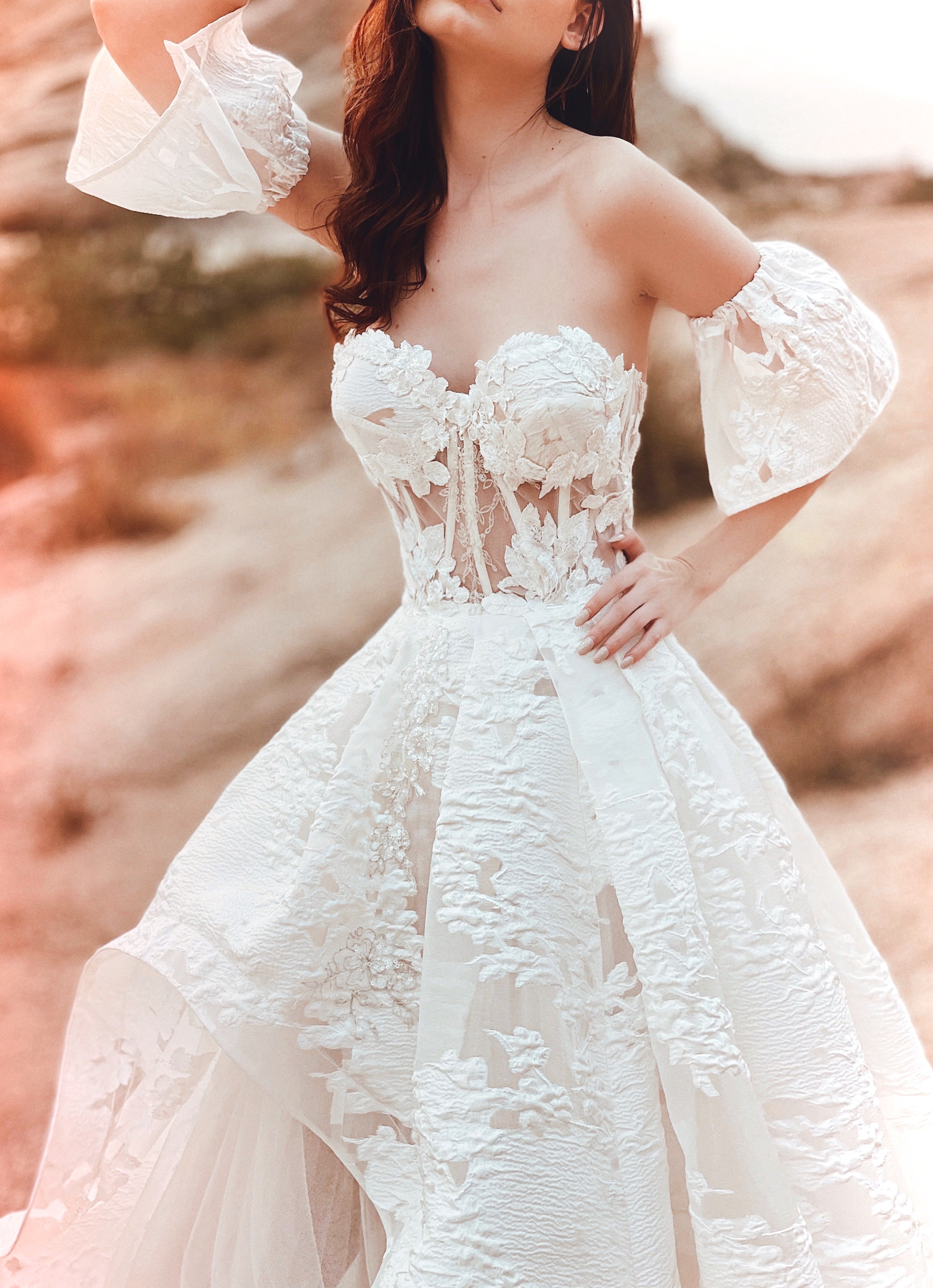 Details on the Lauren Elaine Dove brocade floral organza corset wedding gown.