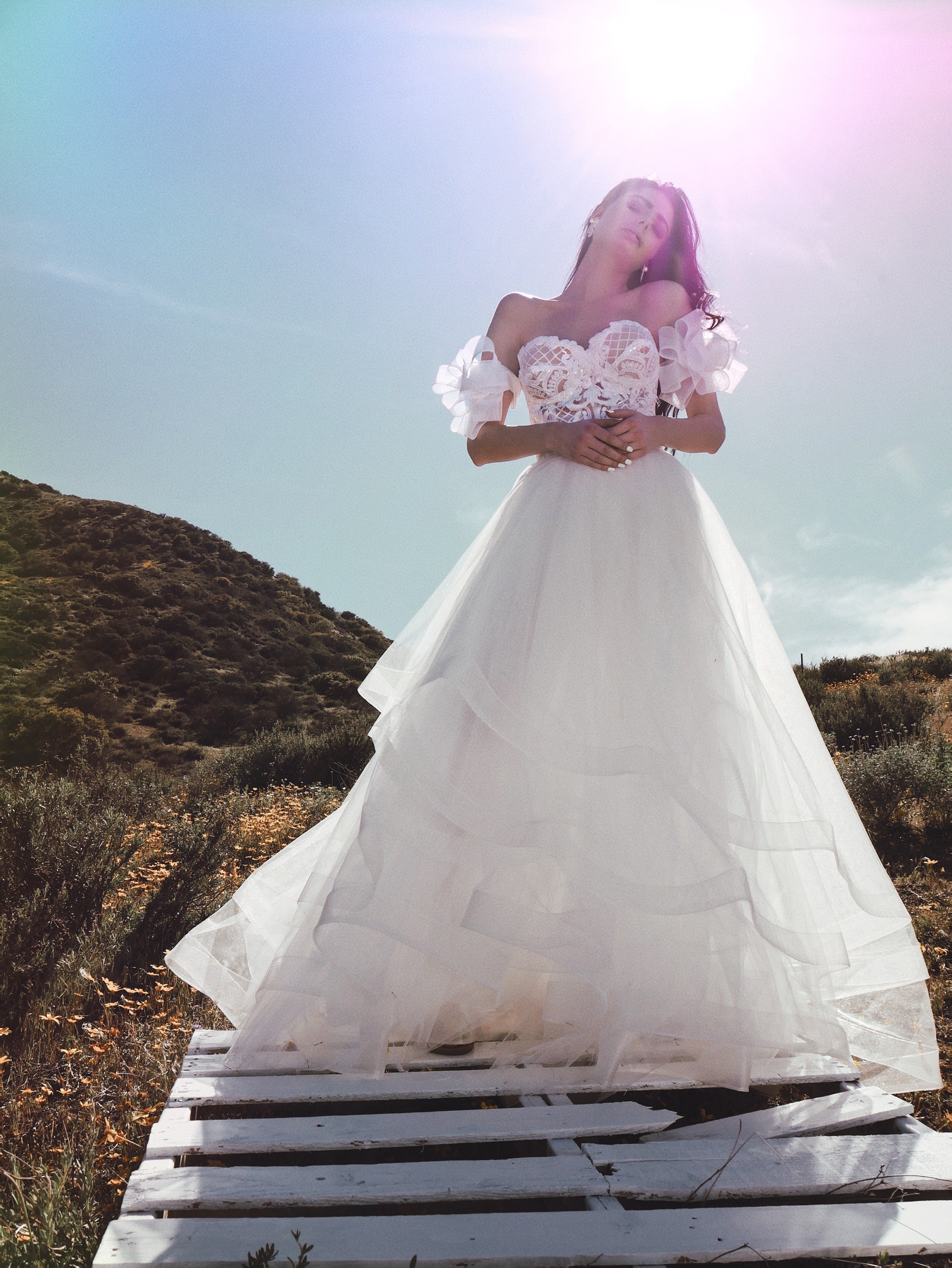 Sequin wedding dress with bow sleeves in meadow